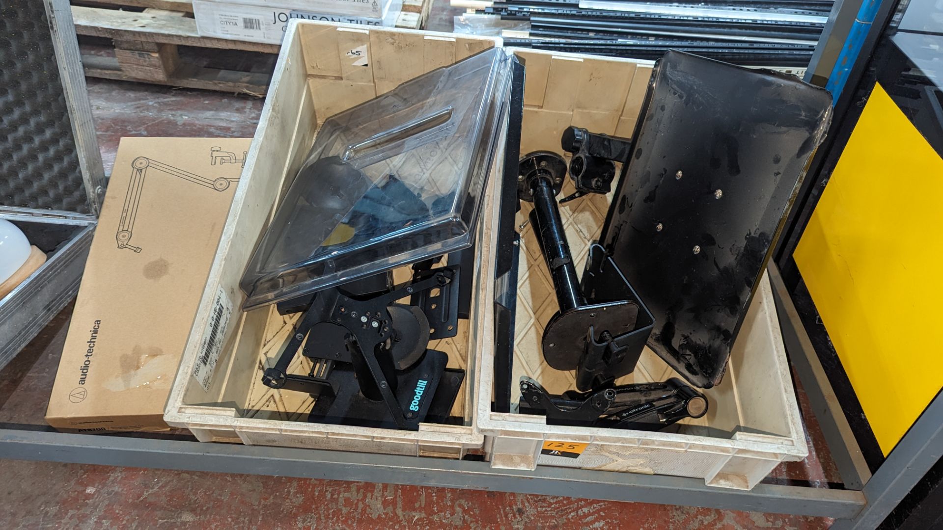 The contents of 2 crates of assorted mounts and arms plus Audio Tecknika mount in a separate box. N