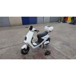 Model 18 Electric Bike: Used/low miles, white body with black detailing. This bike is not brand new,