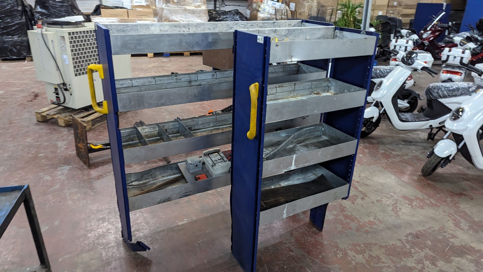 2 off Modula Racking van racks, each with a yellow handle at one end, understood to have been remove