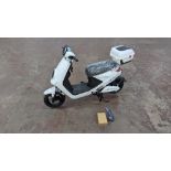 Model 18 Electric Bike: Zero (0) recorded miles, white body with black detailing, lockable storage b