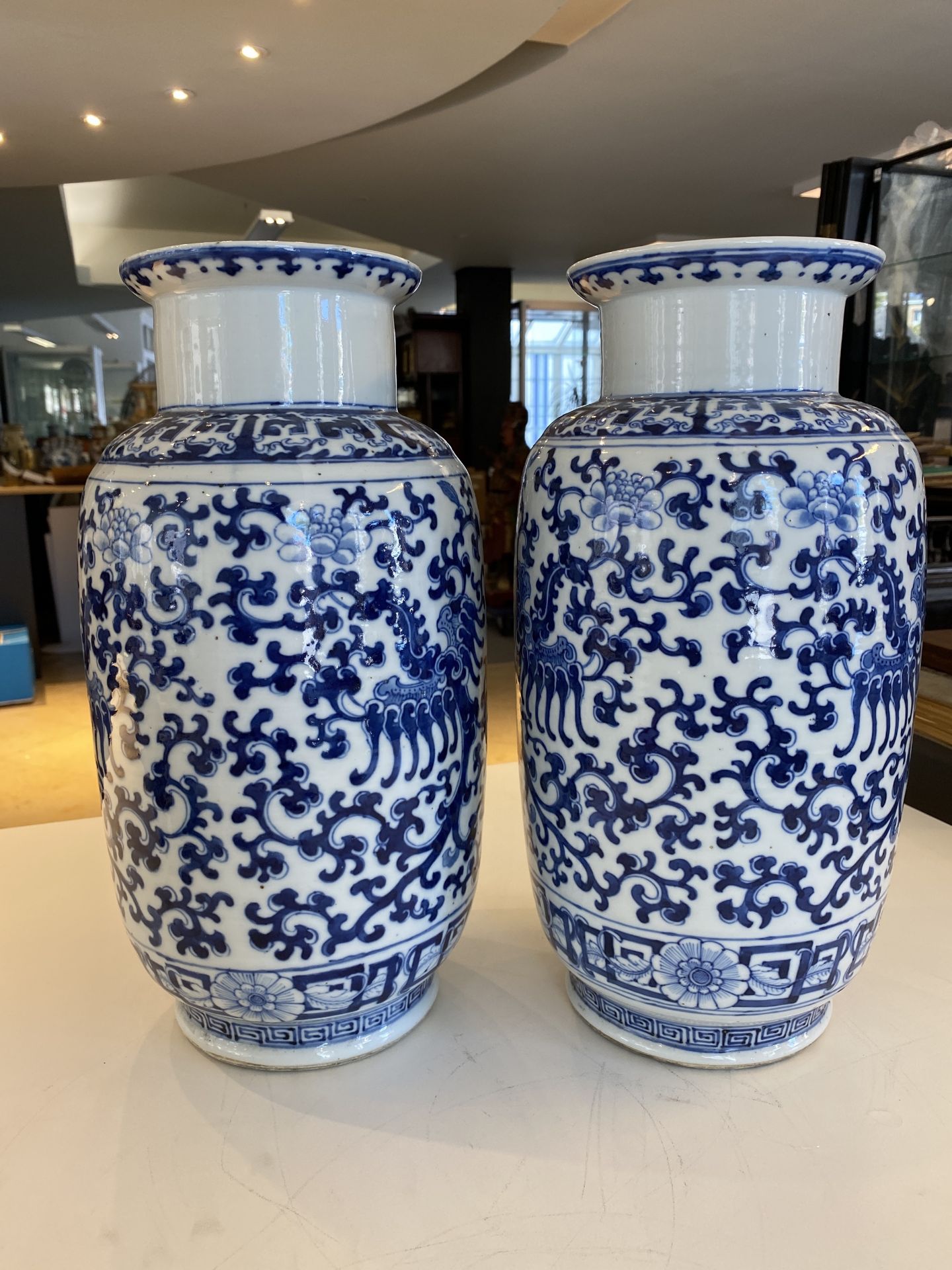 A pair of Chinese blue and white 'phoenix' vases, Kangxi mark, 19th C. - Image 8 of 30