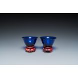 A pair of Chinese blue Beijing glass bowls, 18/19th C.