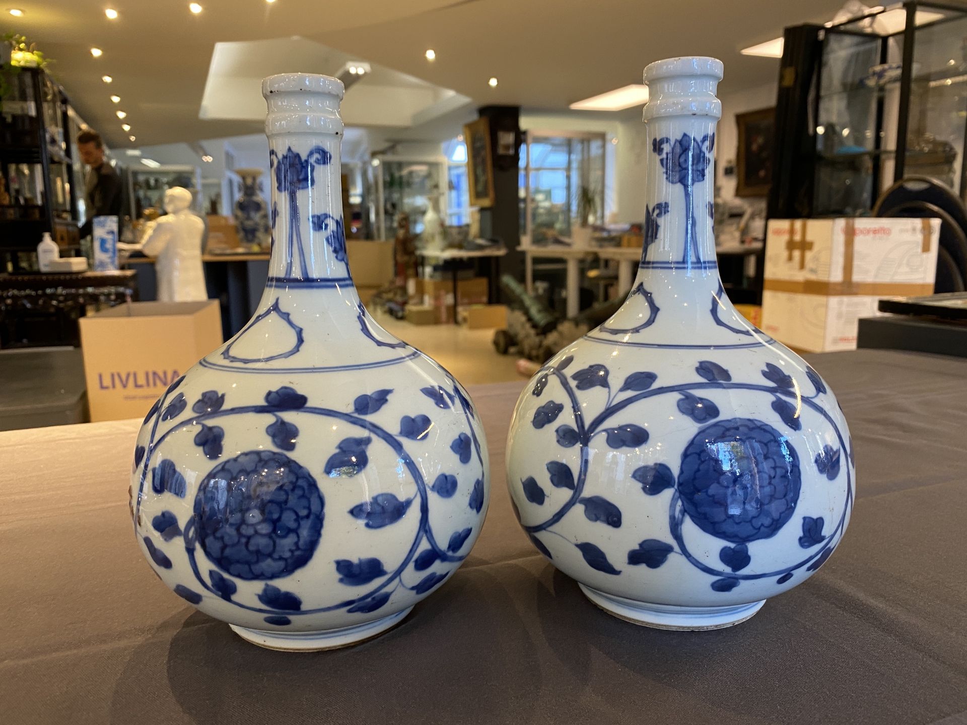 A pair of Chinese blue and white 'peony scroll' pharmacy bottles, Kangxi - Image 9 of 20