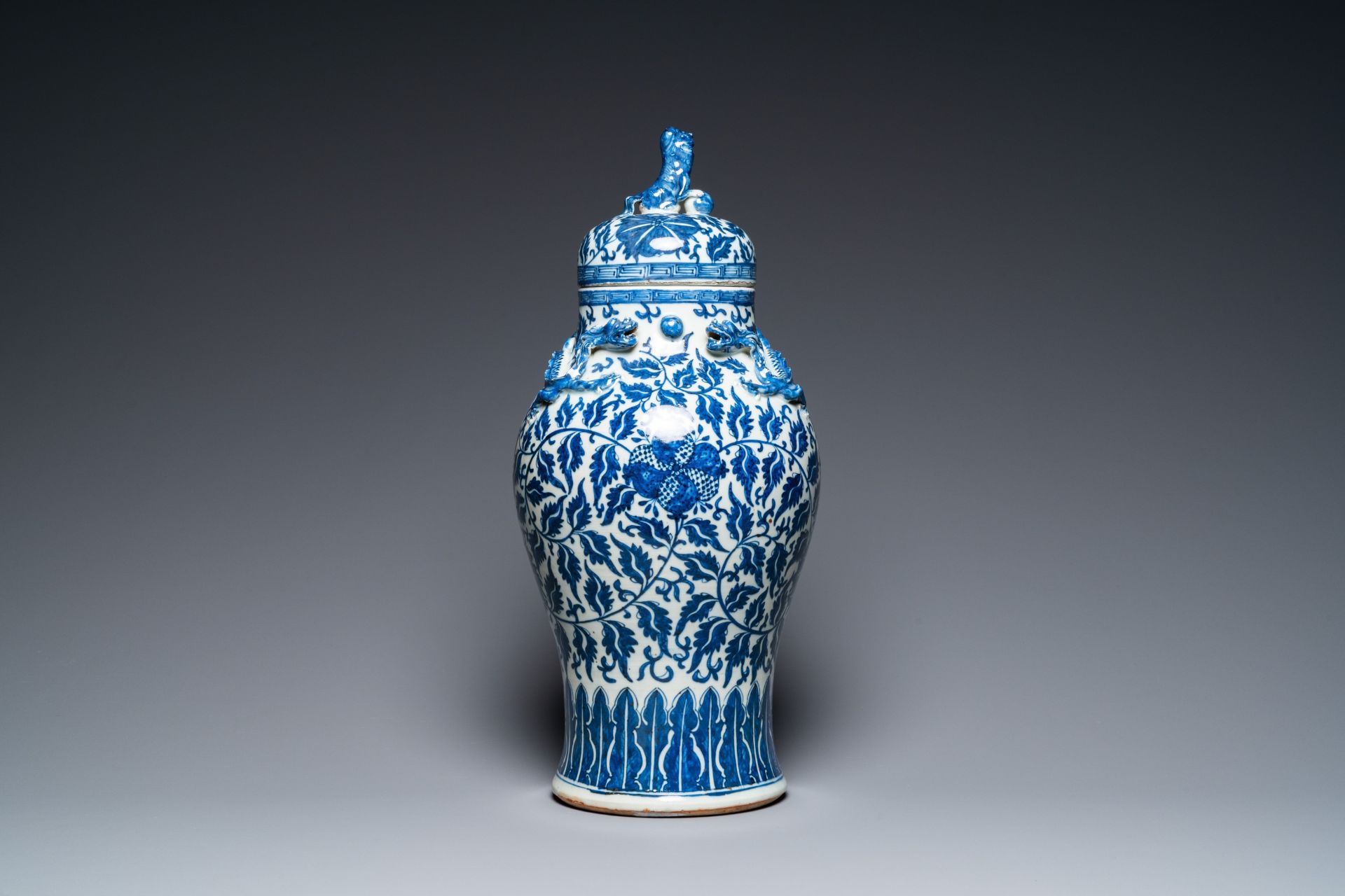 A pair of Chinese famille verte double gourd vases and a blue and white vase and cover, 19/20th C. - Image 2 of 39