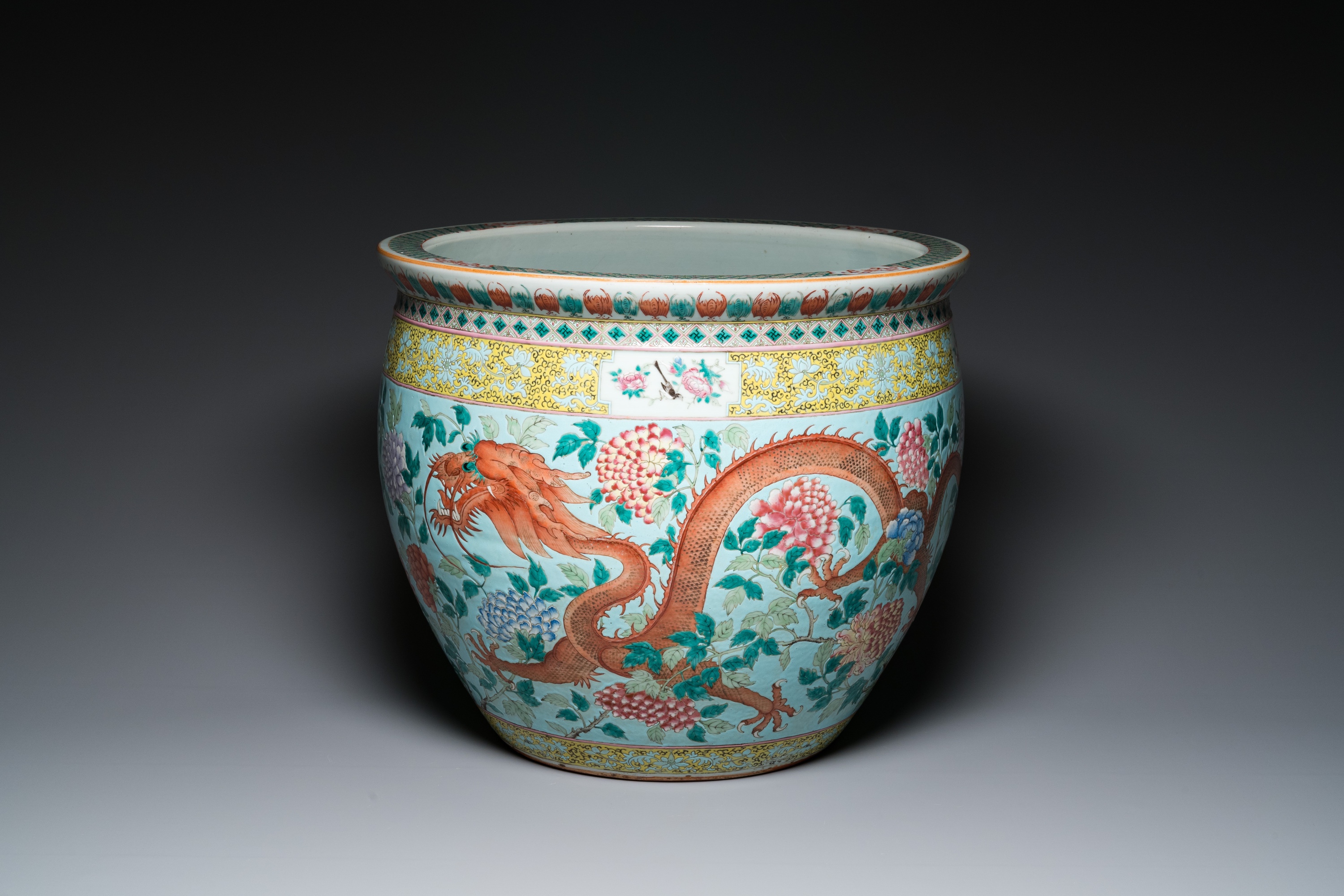 A large Chinese famille verte light blue-ground fish bowl, 19th C.