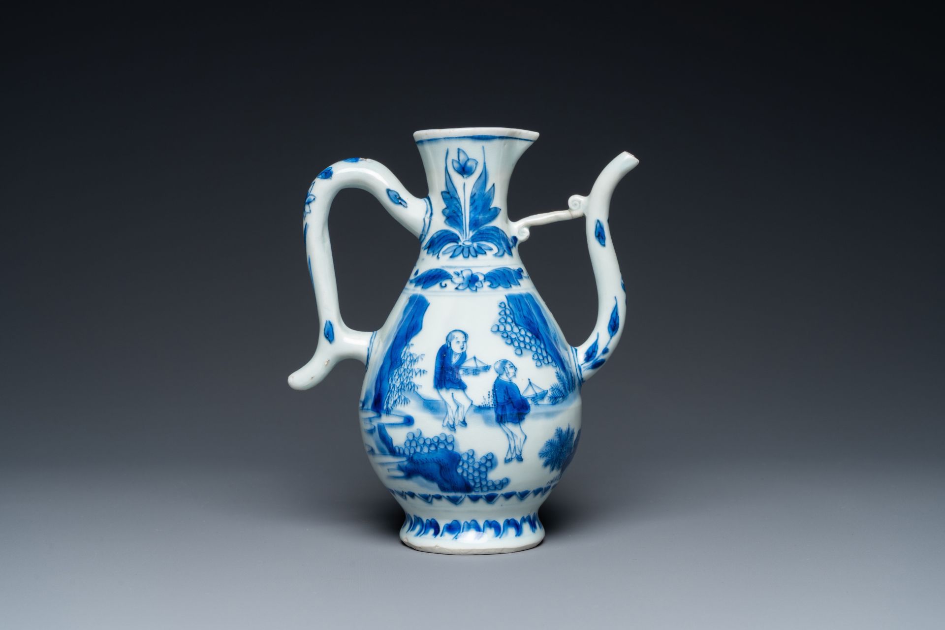 A Chinese blue and white ewer with figures in a landscape, Transitional period - Image 3 of 24