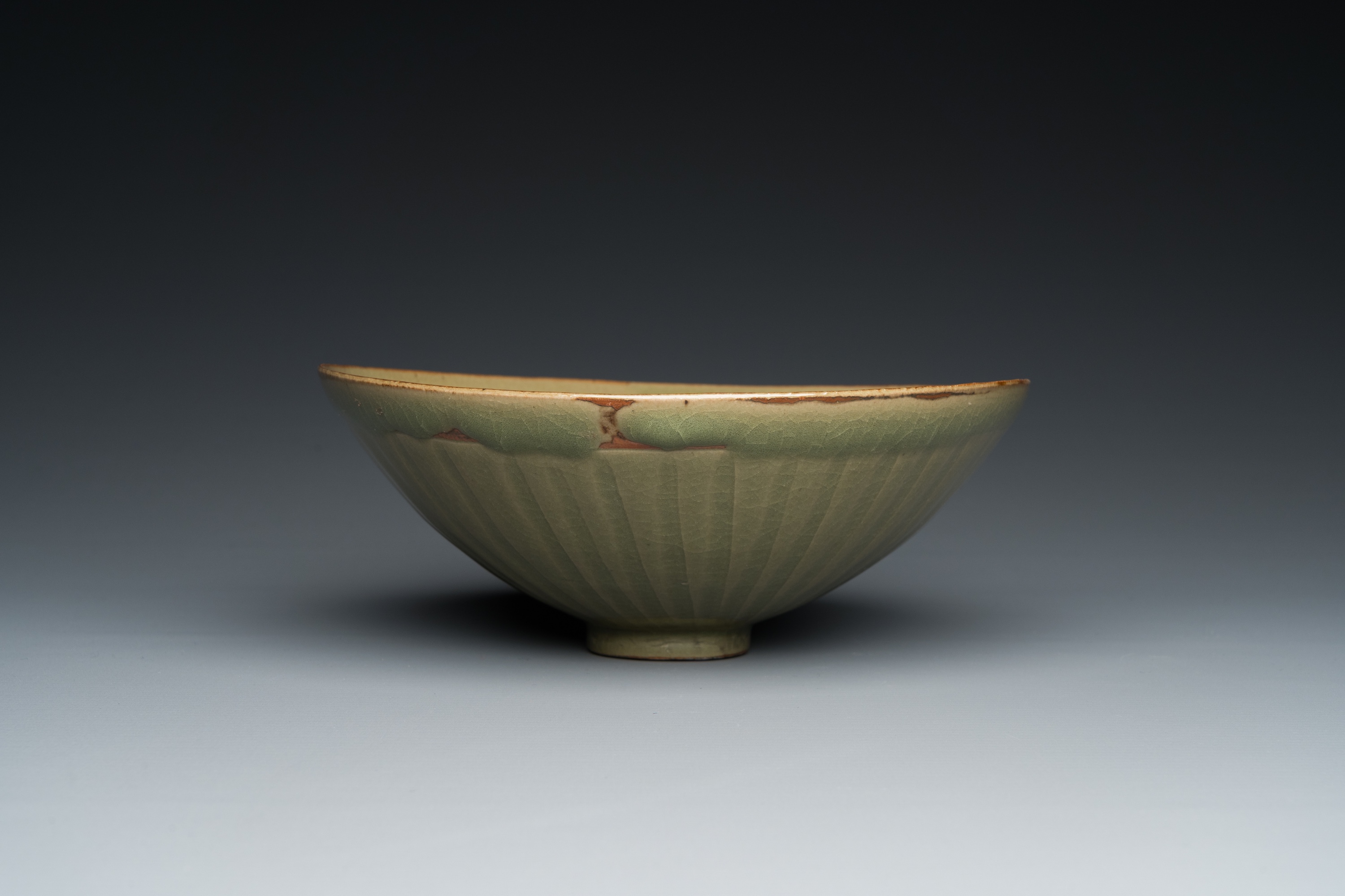 A Chinese Yaozhou celadon bowl with underglaze floral design, probably Song - Image 4 of 7