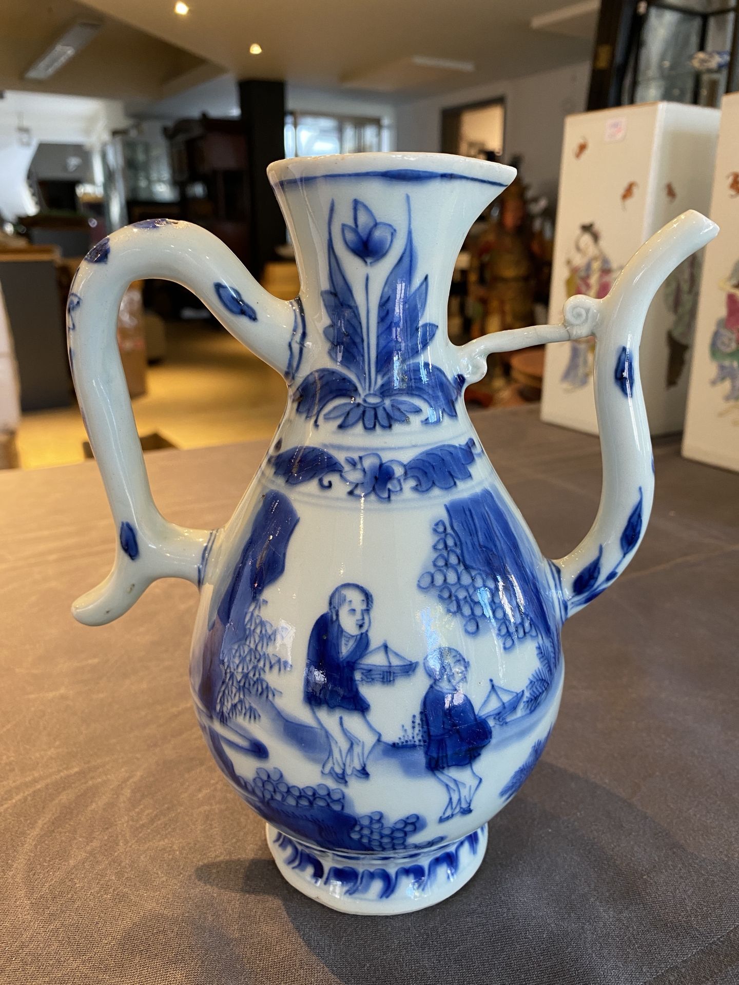 A Chinese blue and white ewer with figures in a landscape, Transitional period - Image 9 of 24