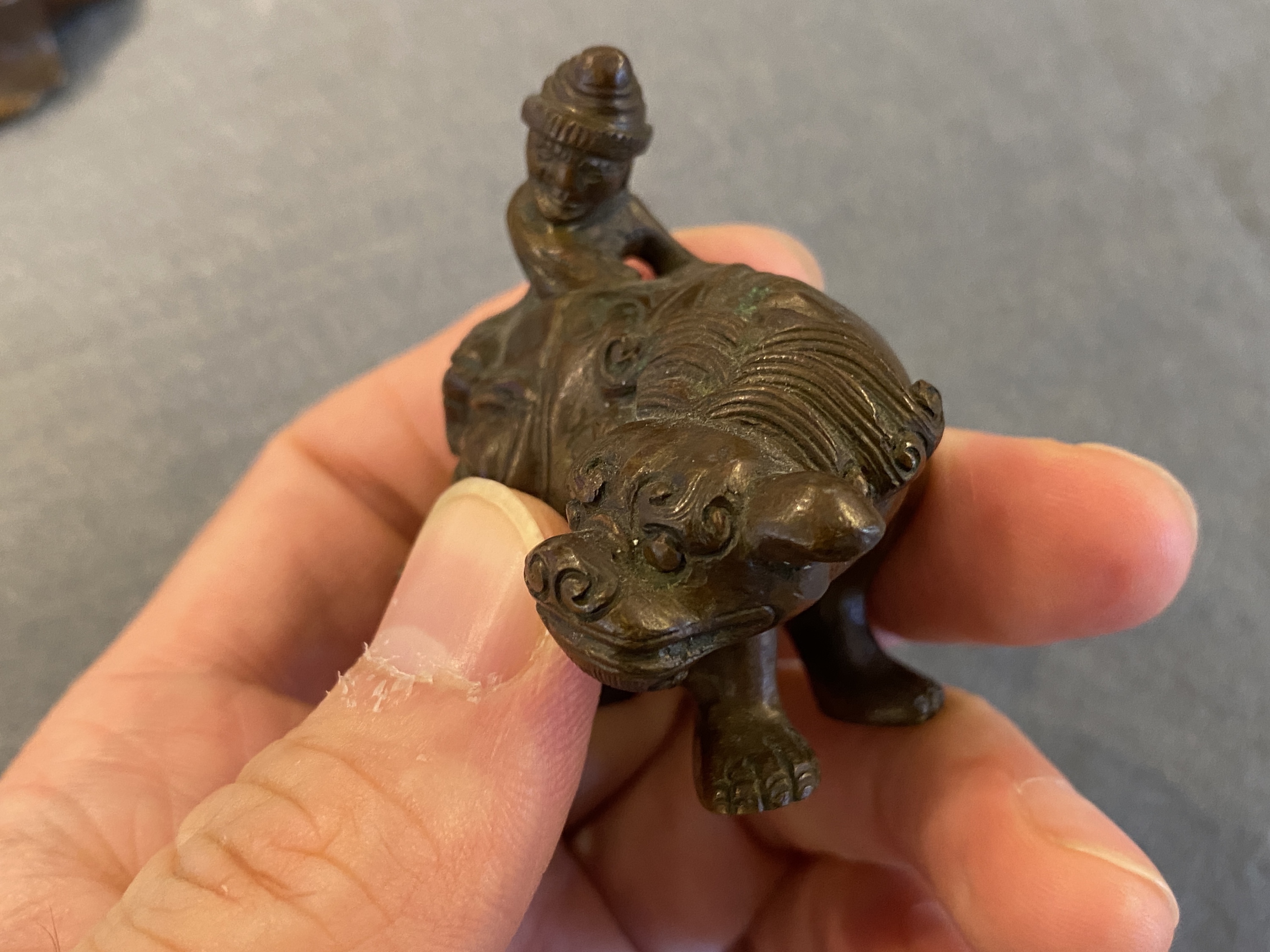 Two Chinese bronze scroll Weights with Sogdian riders on a Buddhist lion and an elephant, Qi - Image 16 of 19