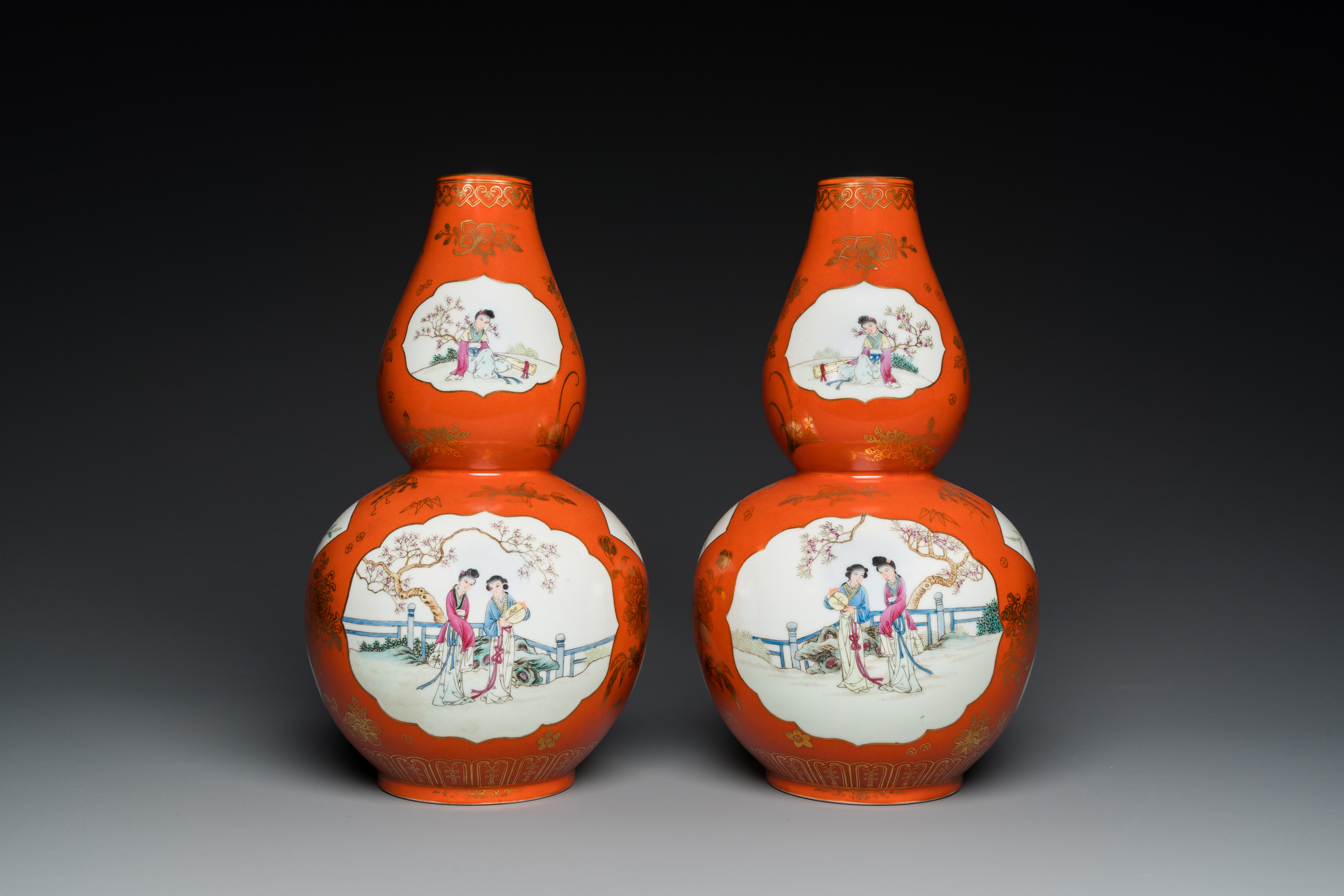 A pair of Chinese coral-ground famille rose double gourd vases, Qianlong mark, Republic