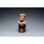 An Italian alabaster bust of a bearded man on a later wooden stand, 16th C.