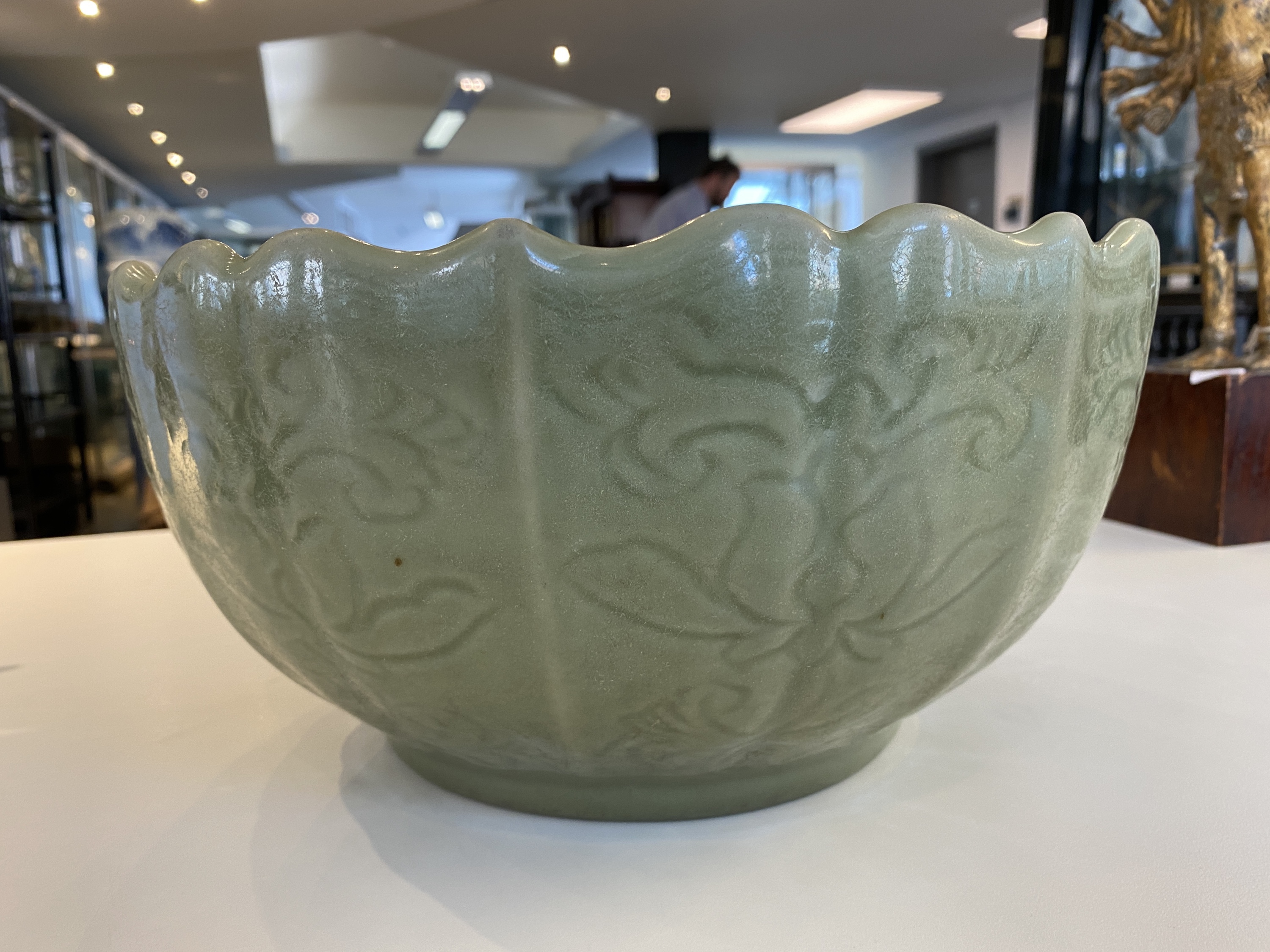A large Chinese Longquan celadon bowl with underglaze lotus design, Ming - Image 13 of 17