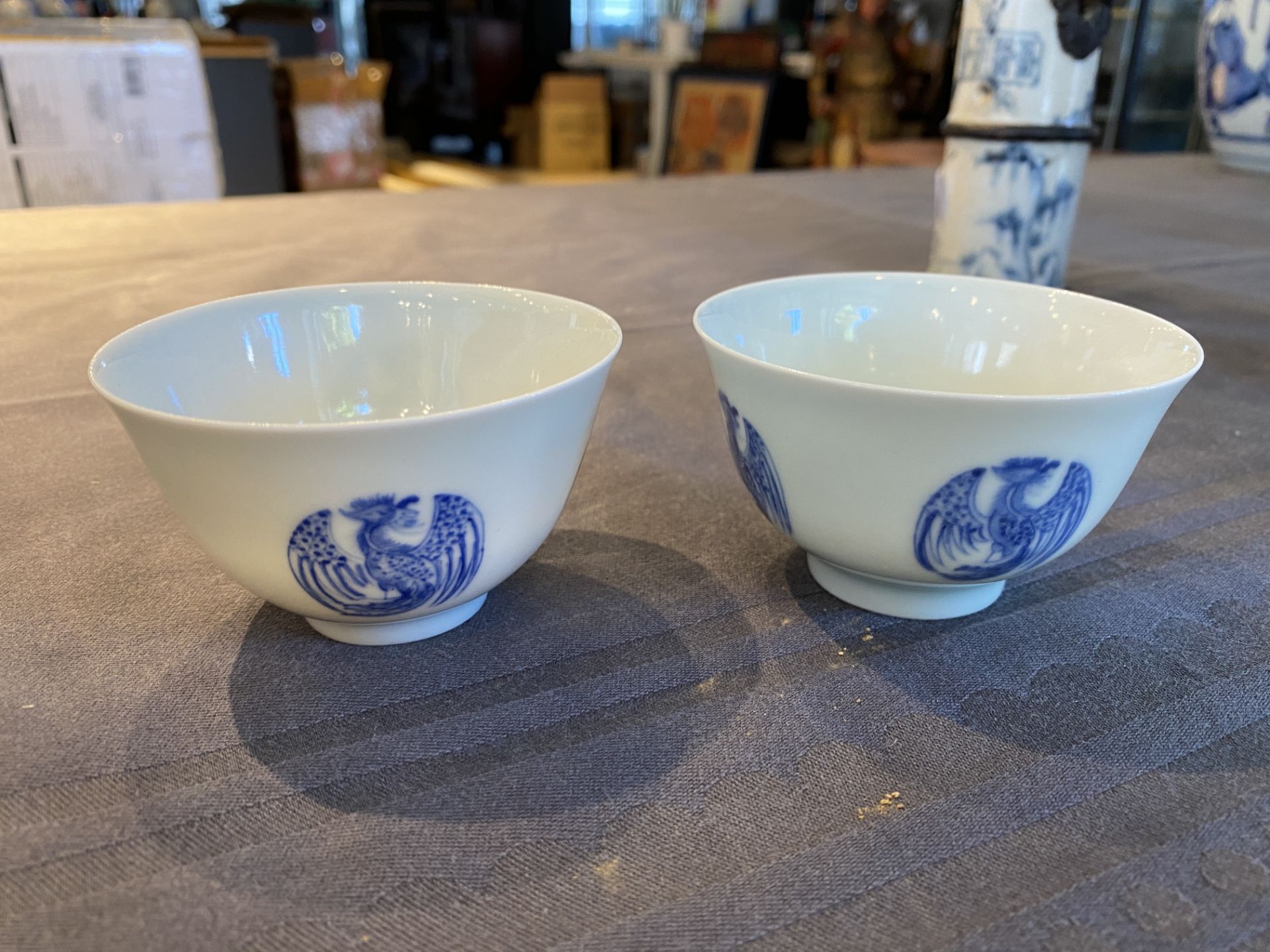 A pair of Chinese blue and white cups, Daoguang mark, 19/20th C. - Image 9 of 17