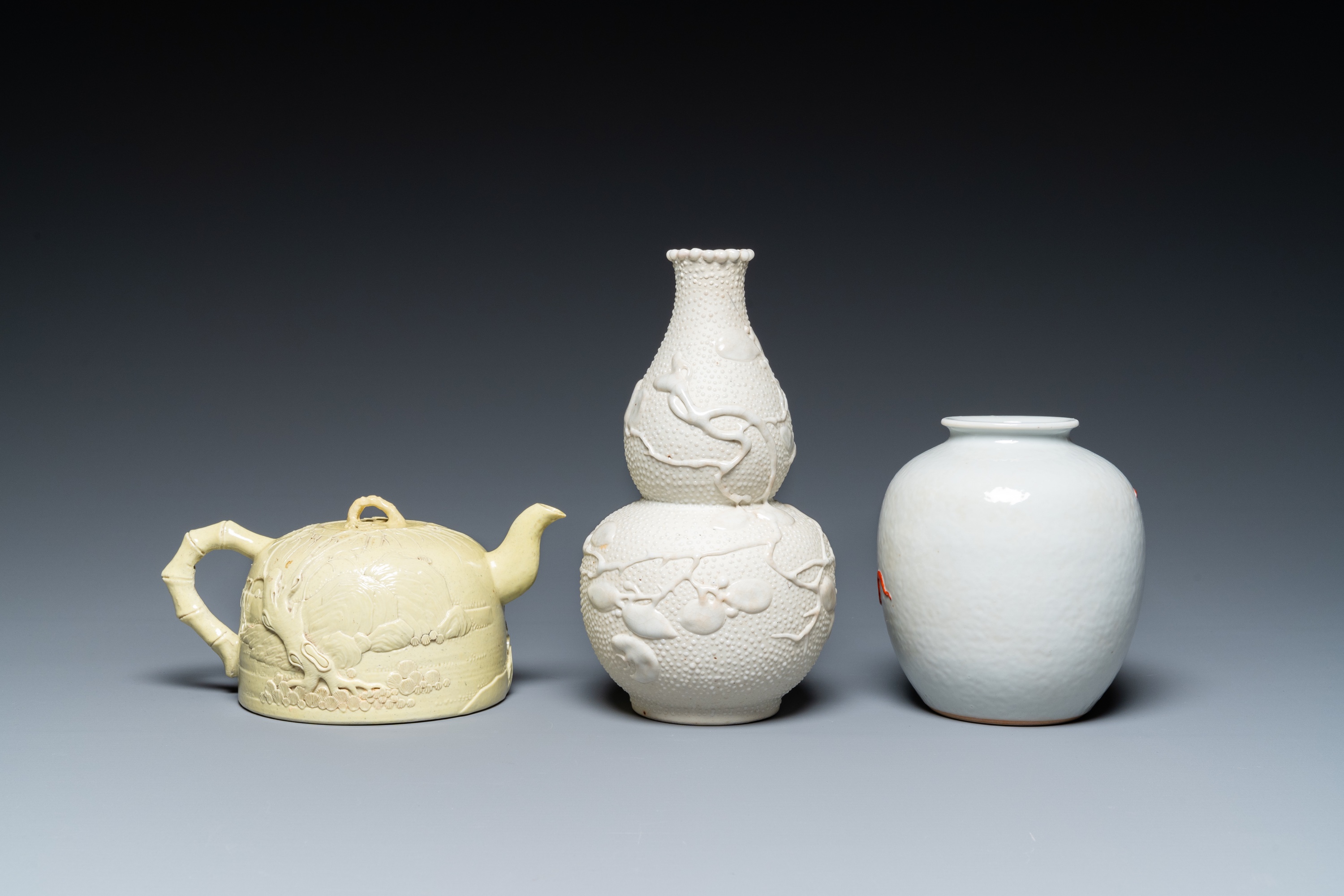 A Chinese yellow-glazed biscuit teapot, a white-glazed biscuit double gourd vase and an iron-red 'ph - Image 4 of 7