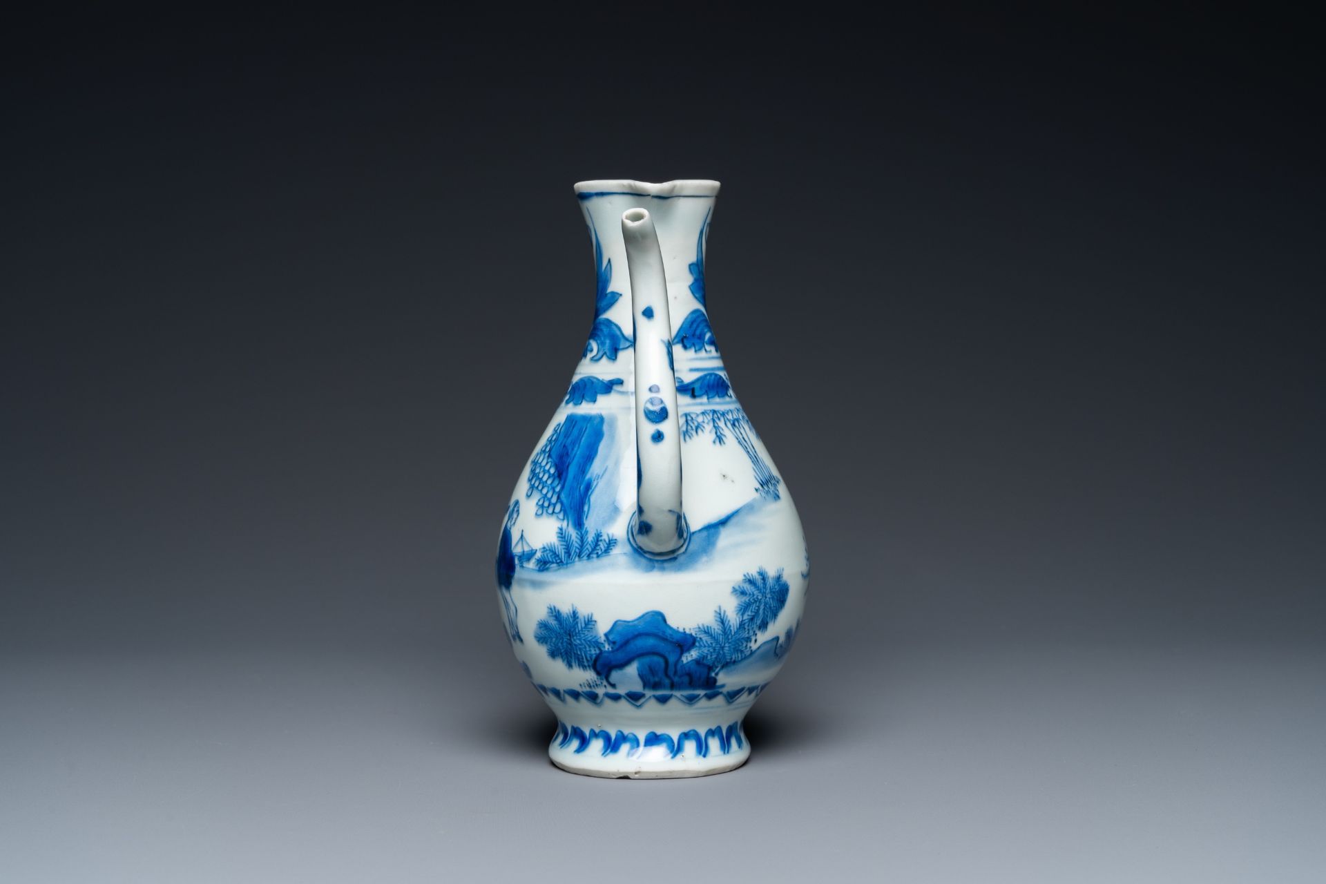 A Chinese blue and white ewer with figures in a landscape, Transitional period - Image 4 of 24