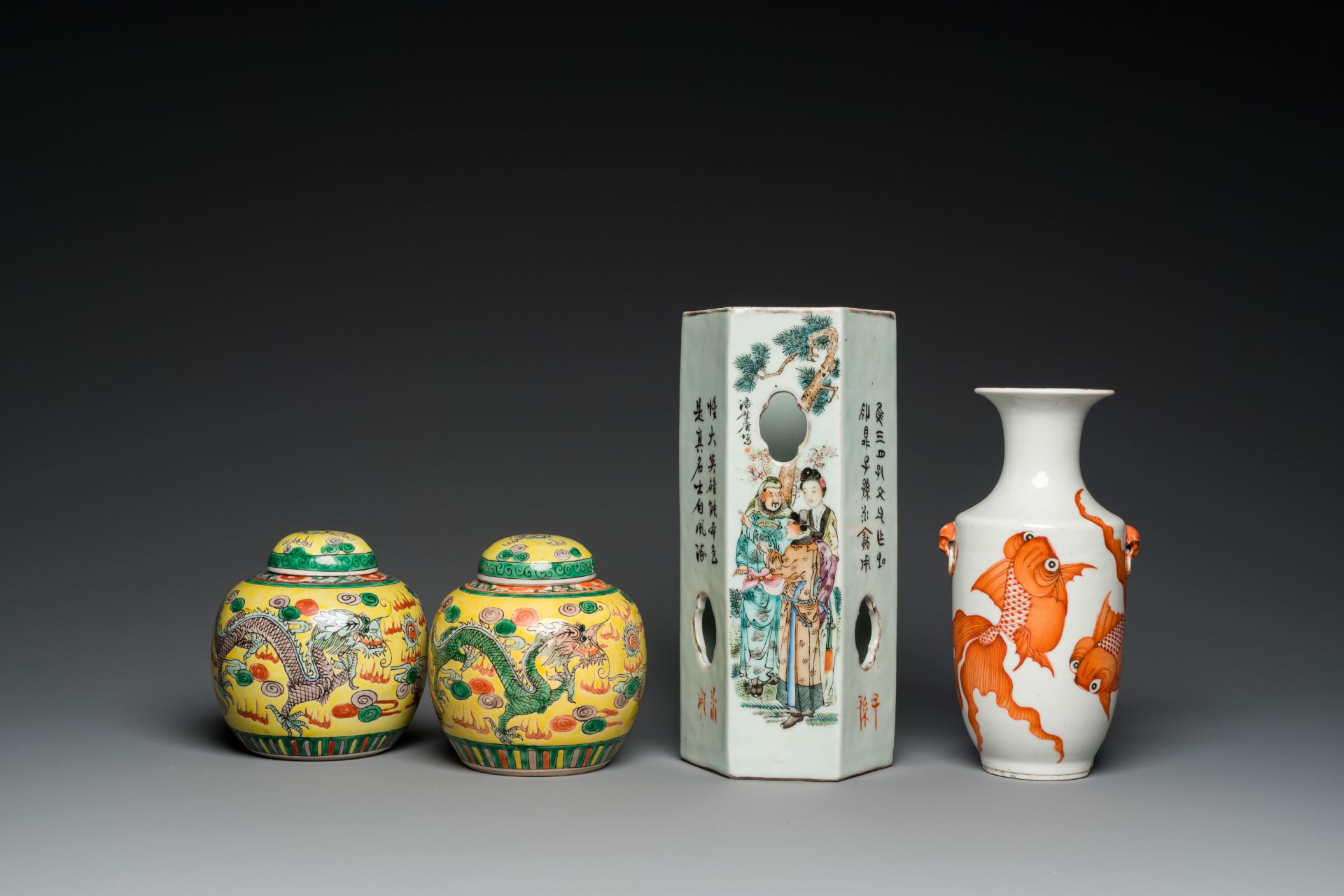 A pair of Chinese 'dragon' jars and covers, a 'goldfish' vase and a qianjiang cai hat stand, 19/20th