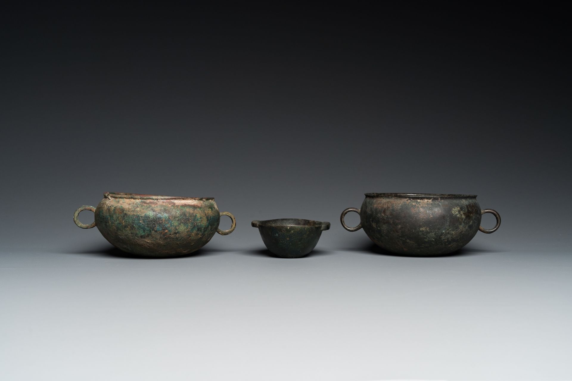 Three Chinese elliptical bronze cups, Eastern Zhou and Han - Image 4 of 8