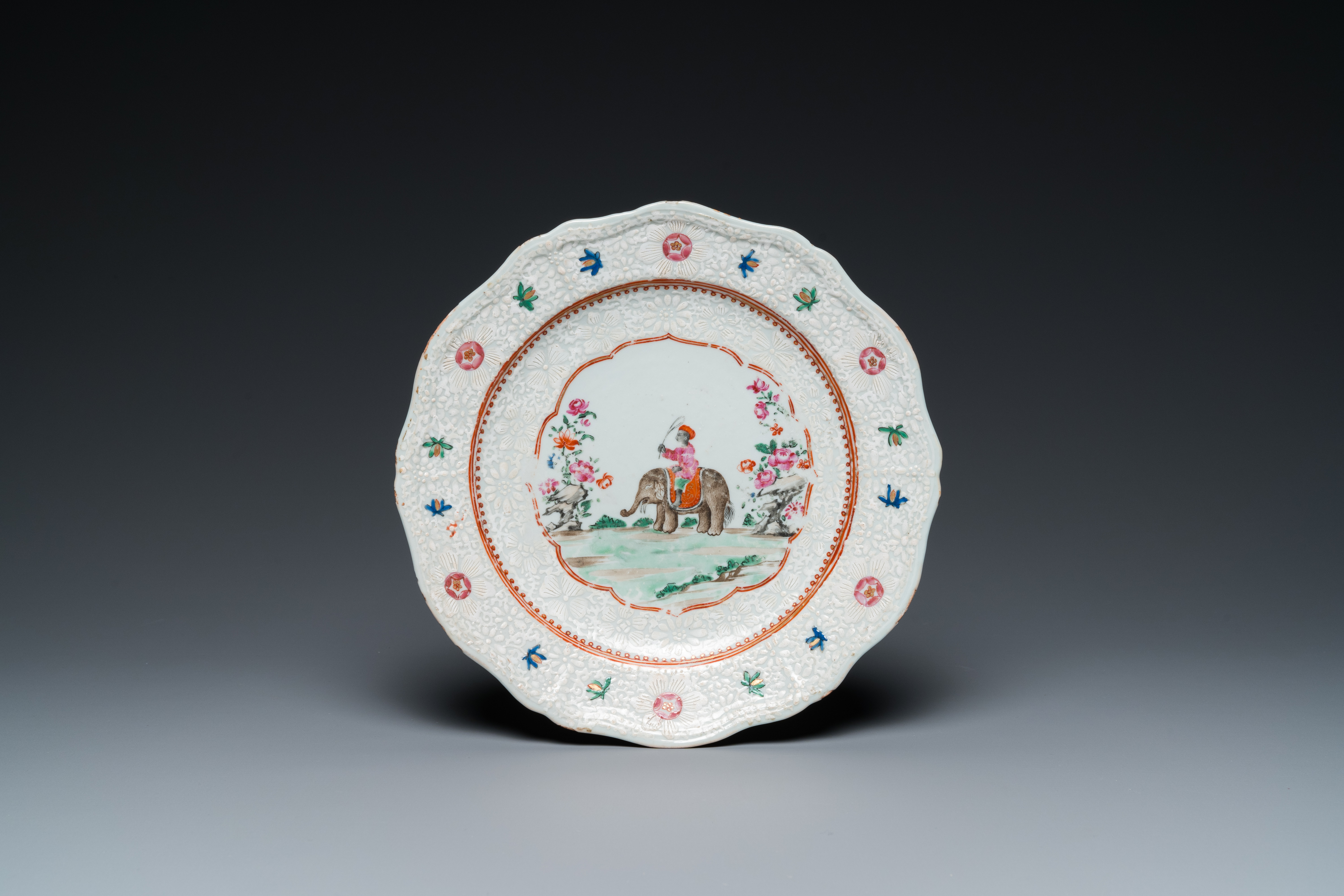 A Chinese famille rose Indian market plate with an elephant and rider, Qianlong