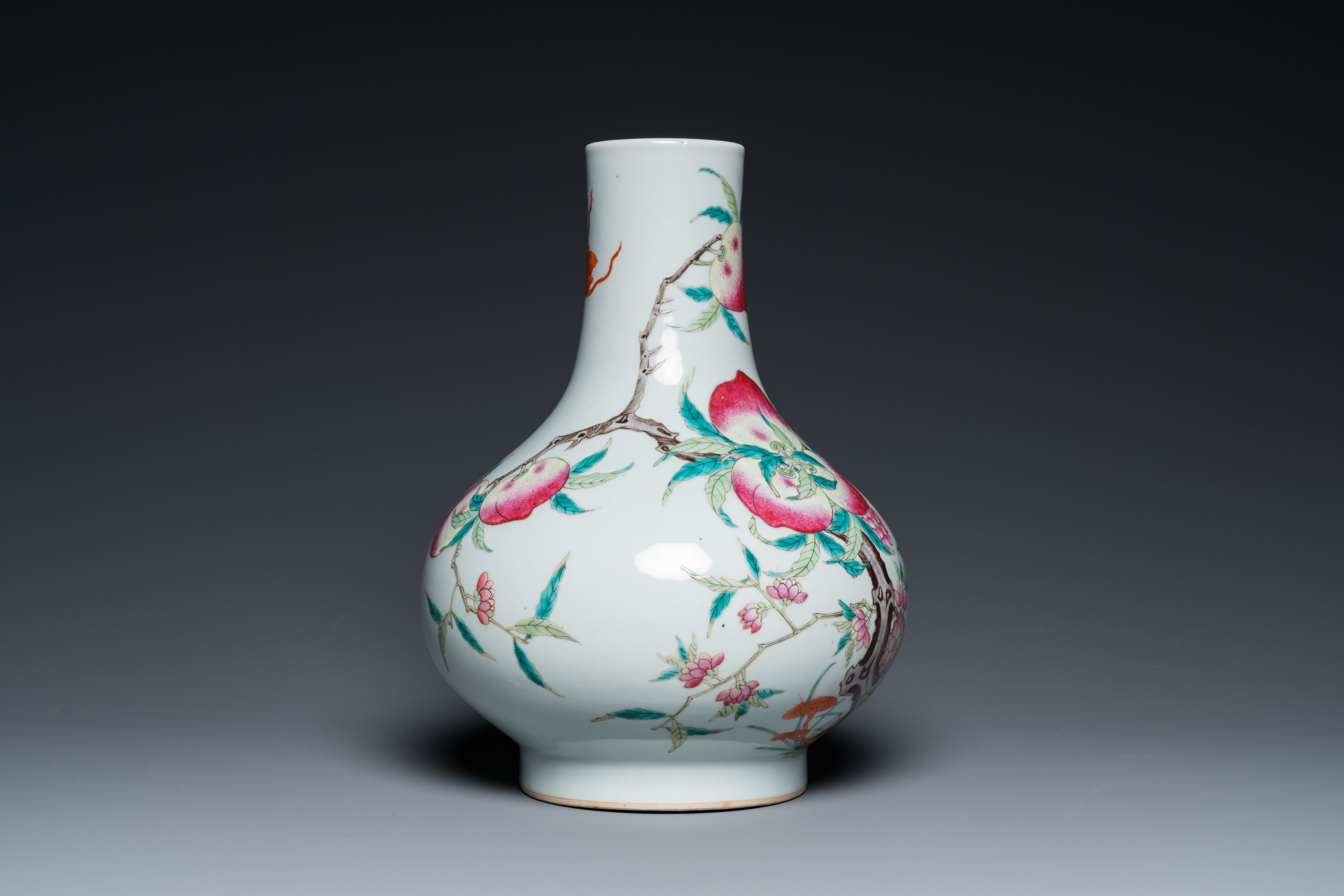 A Chinese famille rose 'nine peaches' bottle vase, 19th C. - Image 4 of 18