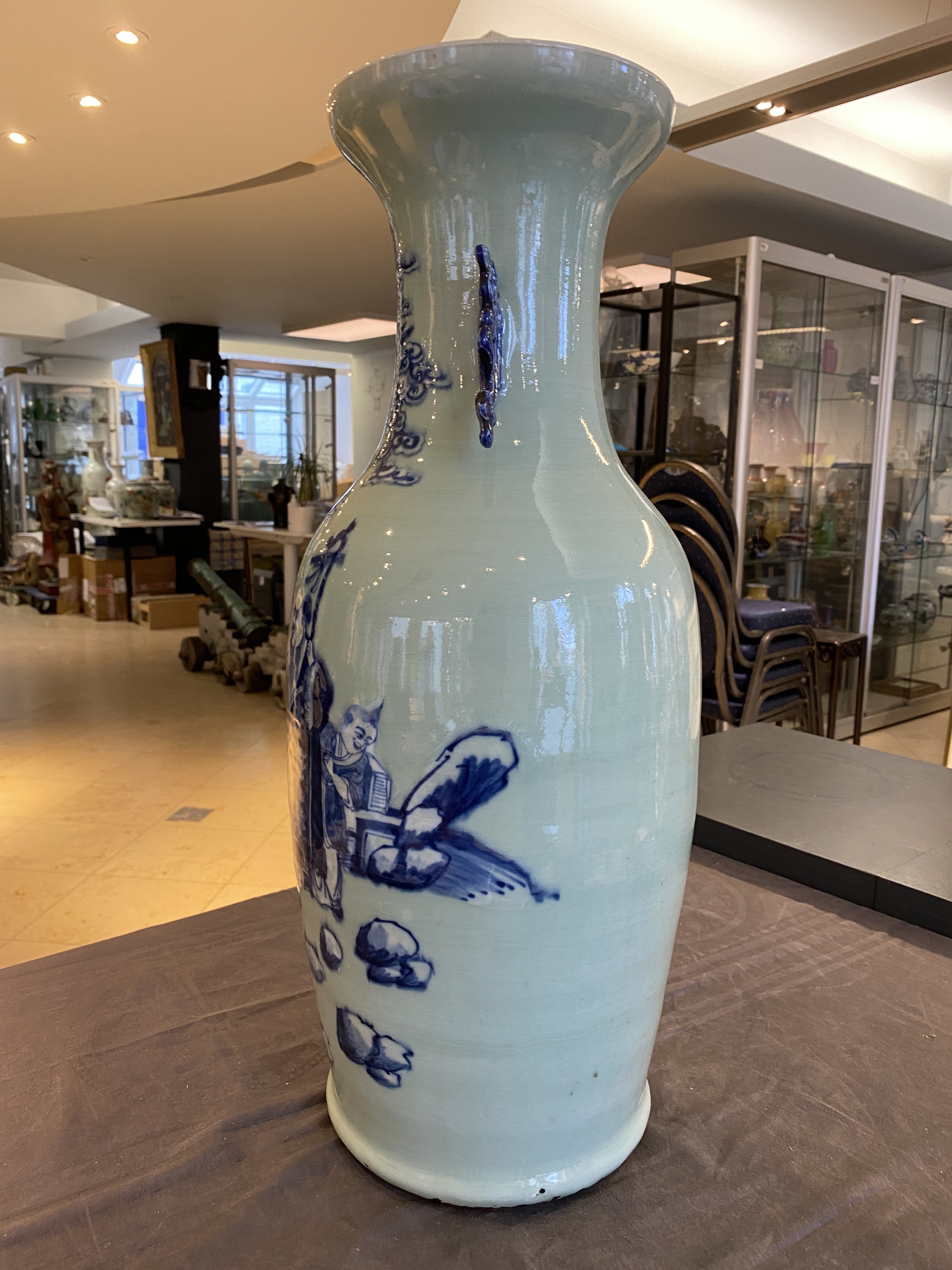 A Chinese blue and white celadon-ground 'immortals' vase, 19th C. - Image 8 of 17