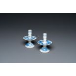 A pair of Chinese blue and white 'Bleu de Hue' candlesticks for the Vietnamese market, four characte