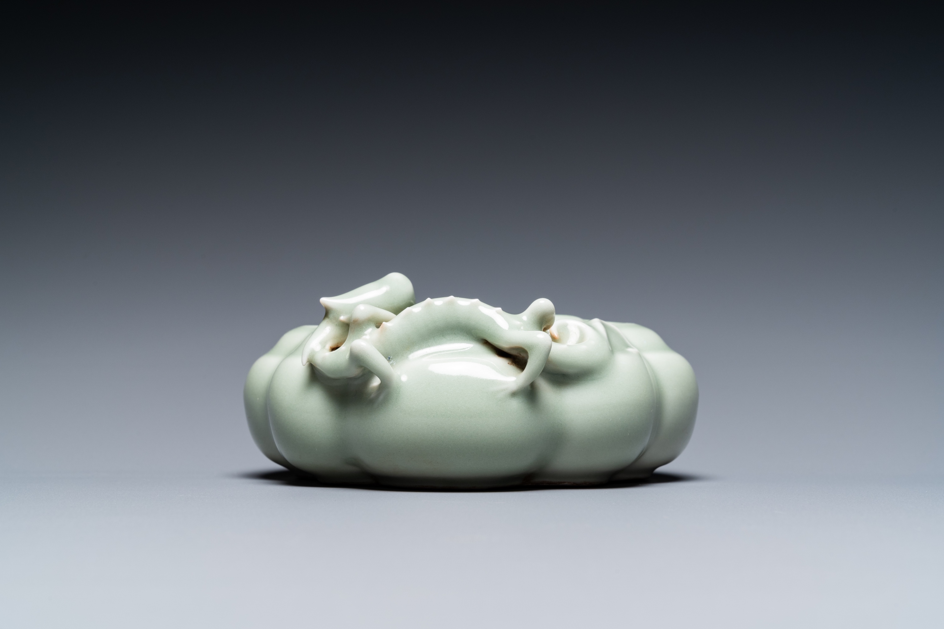 A Chinese celadon-glazed 'lingzhi' brush washer, Qianlong mark, 19/20th C. - Image 7 of 15