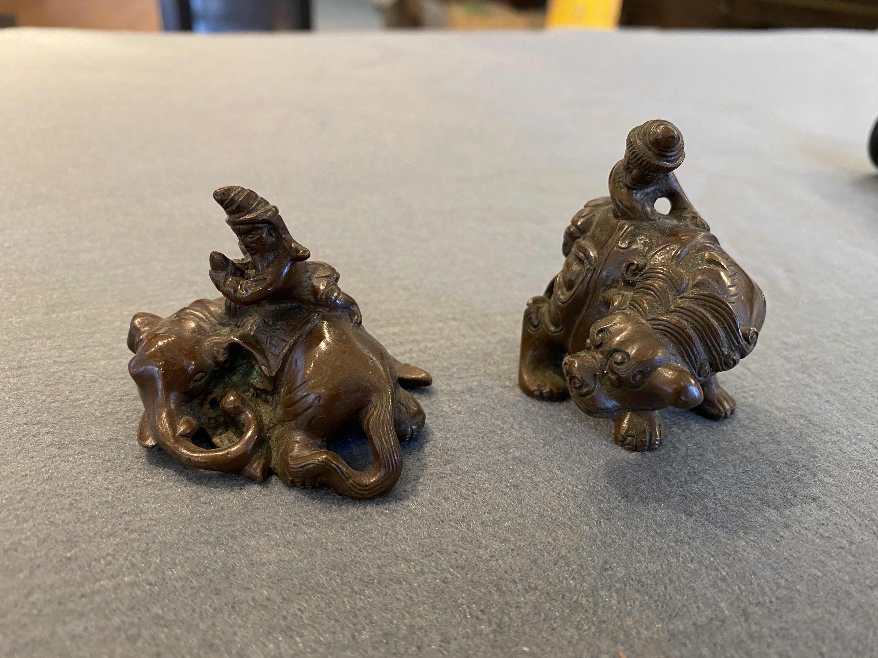 Two Chinese bronze scroll Weights with Sogdian riders on a Buddhist lion and an elephant, Qi - Image 8 of 19