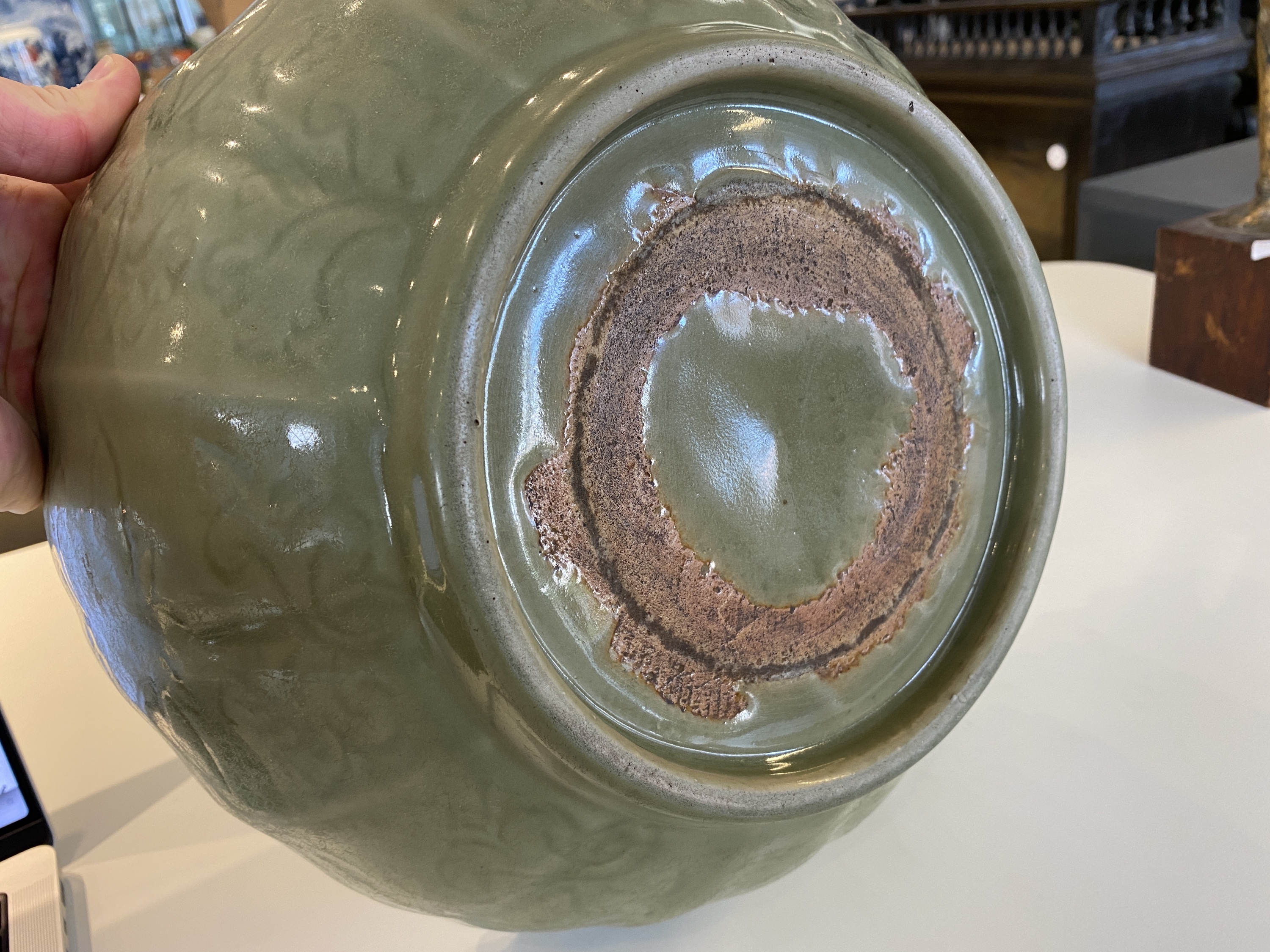 A large Chinese Longquan celadon bowl with underglaze lotus design, Ming - Image 15 of 17