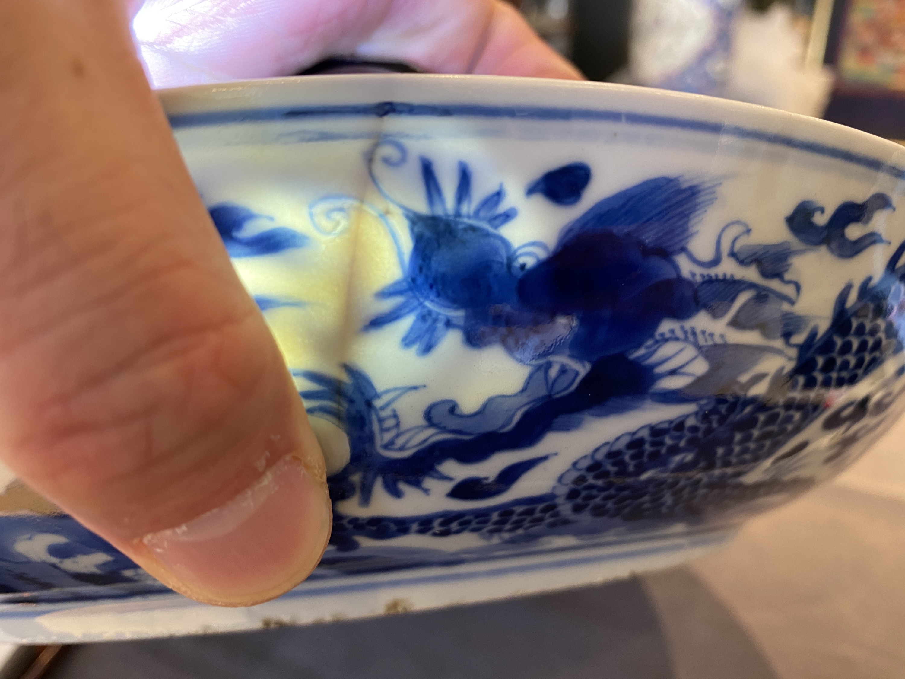 A Chinese blue and white 'dragon' dish, Kangxi mark and of the period - Image 13 of 18