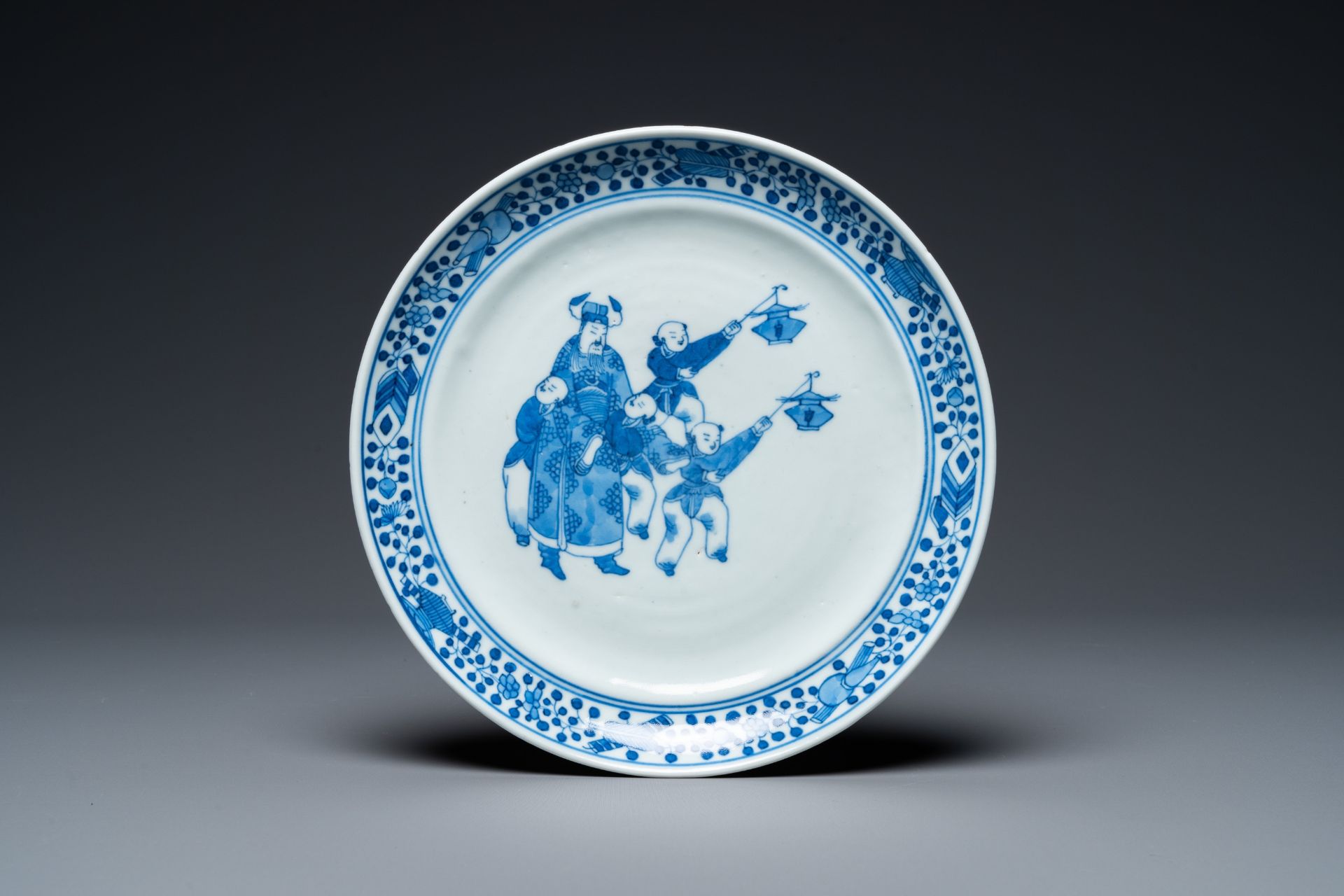 A Chinese blue and white 'Lantern festival' plate, 19th C.