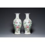 A pair of Chinese famille rose vases with floral design, Qianlong mark, 19/20th C.