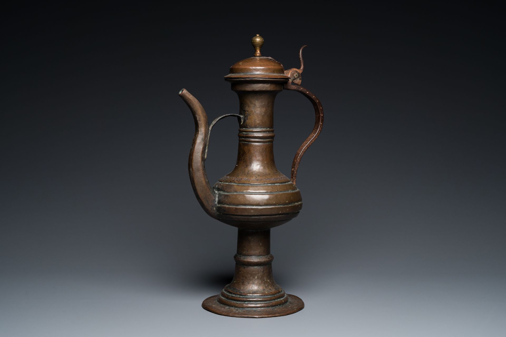 A large German brass ewer and cover, Nuremberg, 15th C.