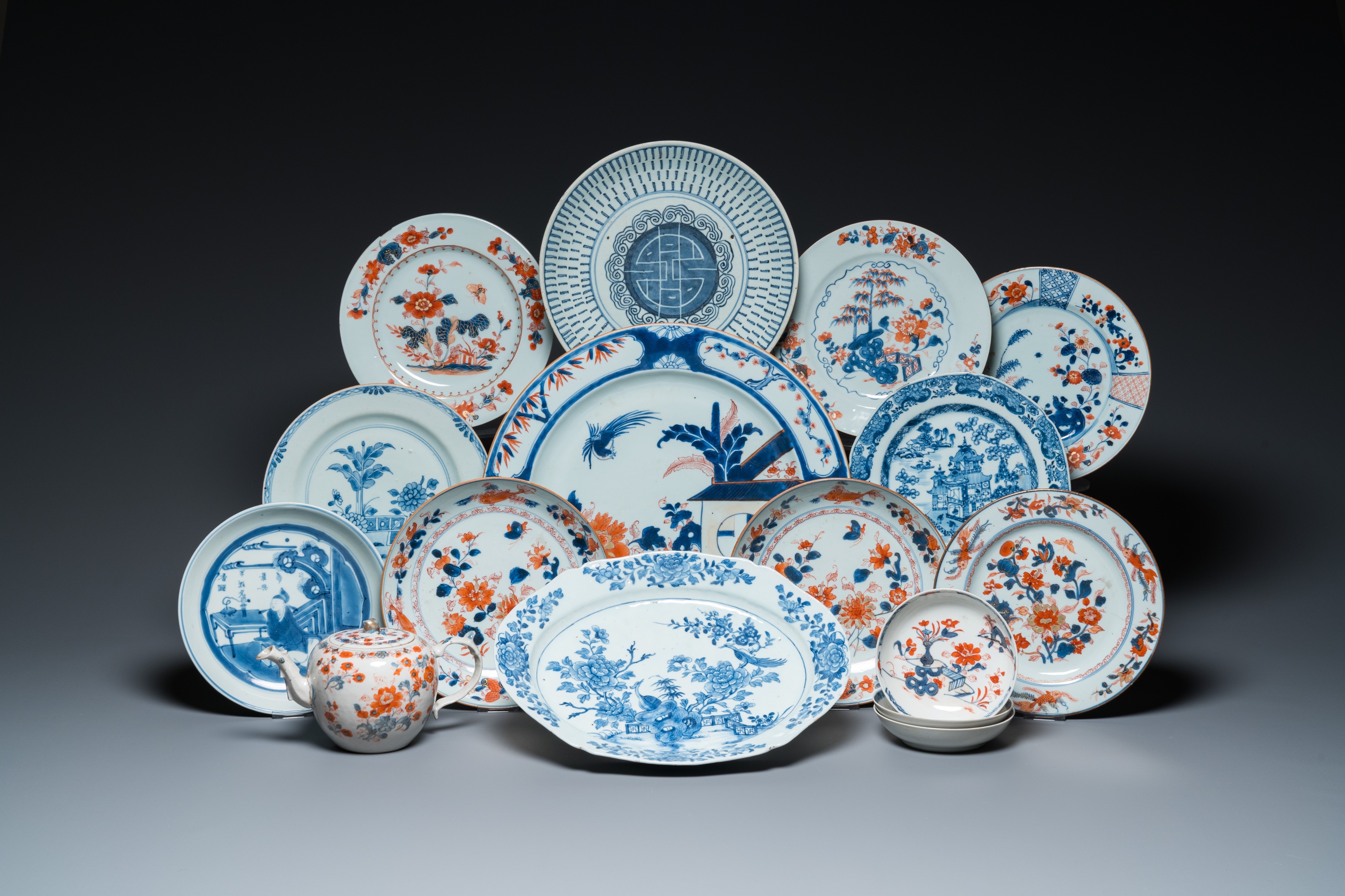 15 Chinese blue and white and Imari-style dishes and a teapot, Kangxi and later