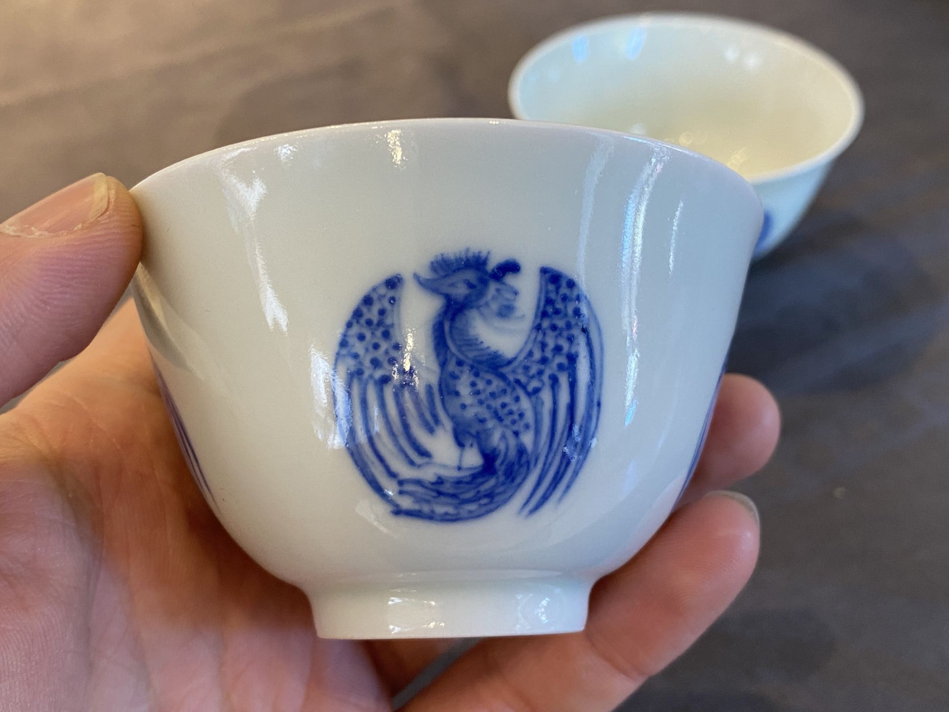 A pair of Chinese blue and white cups, Daoguang mark, 19/20th C. - Image 11 of 17