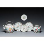 Two Chinese famille rose teapots and four small plates, 19th C.