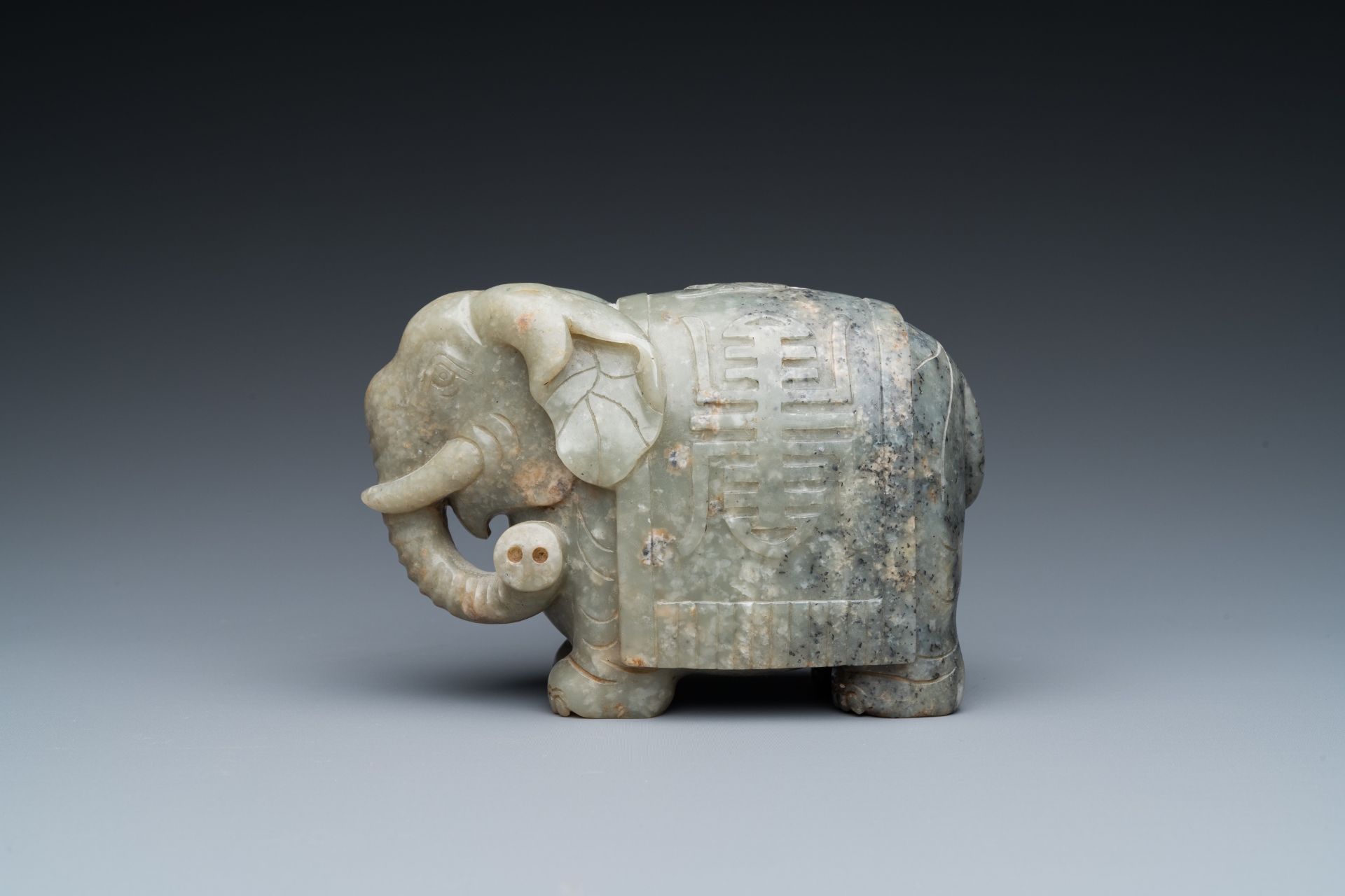 A Chinese grey-speckled celadon jade elephant, Qing - Image 2 of 18