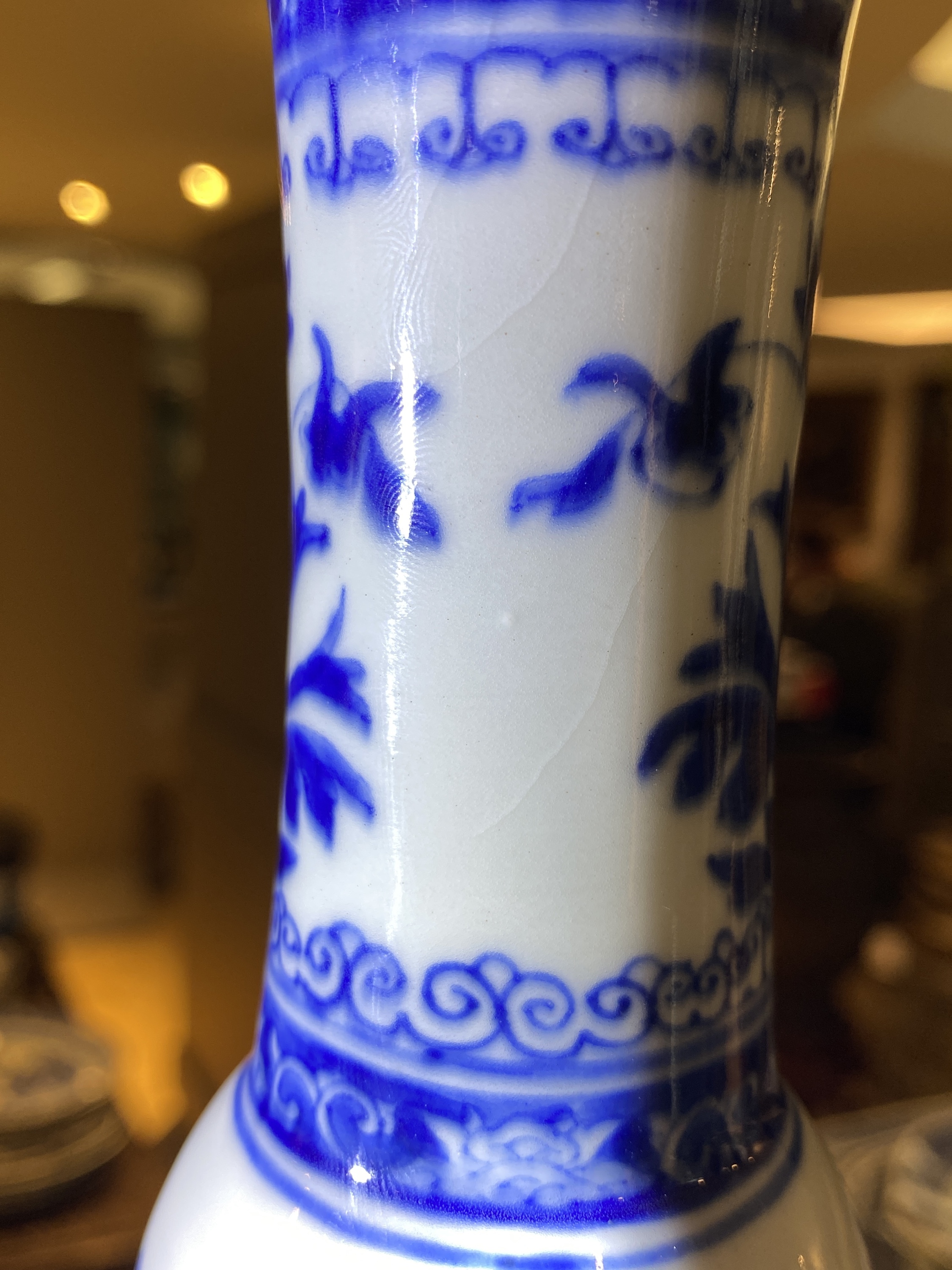 A Chinese blue and white bottle vase with floral design, Kangxi - Image 17 of 23