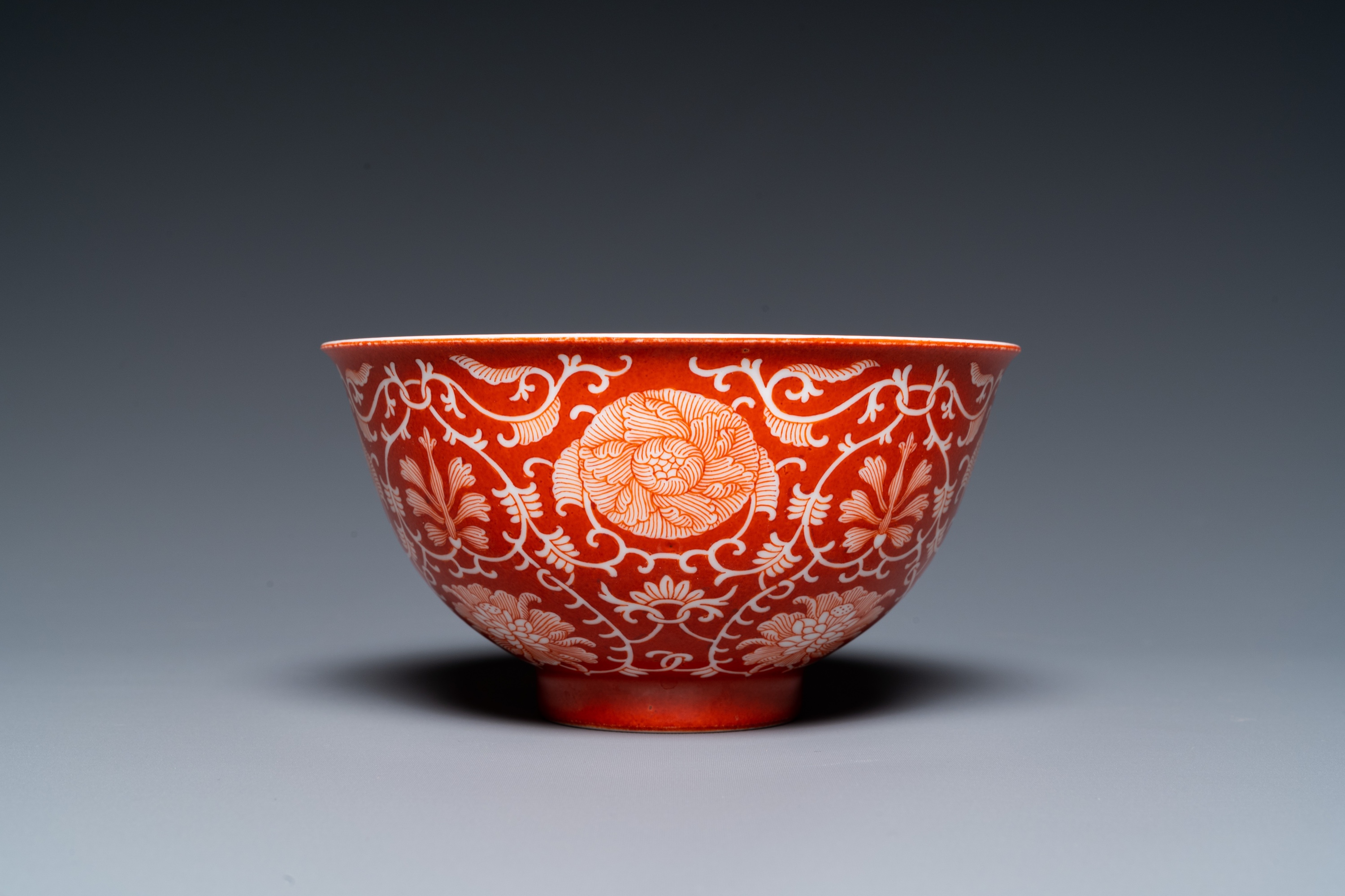 A Chinese coral-ground reserve-decorated 'lotus' bowl, Jiaqing mark, 19/20th C. - Image 4 of 18