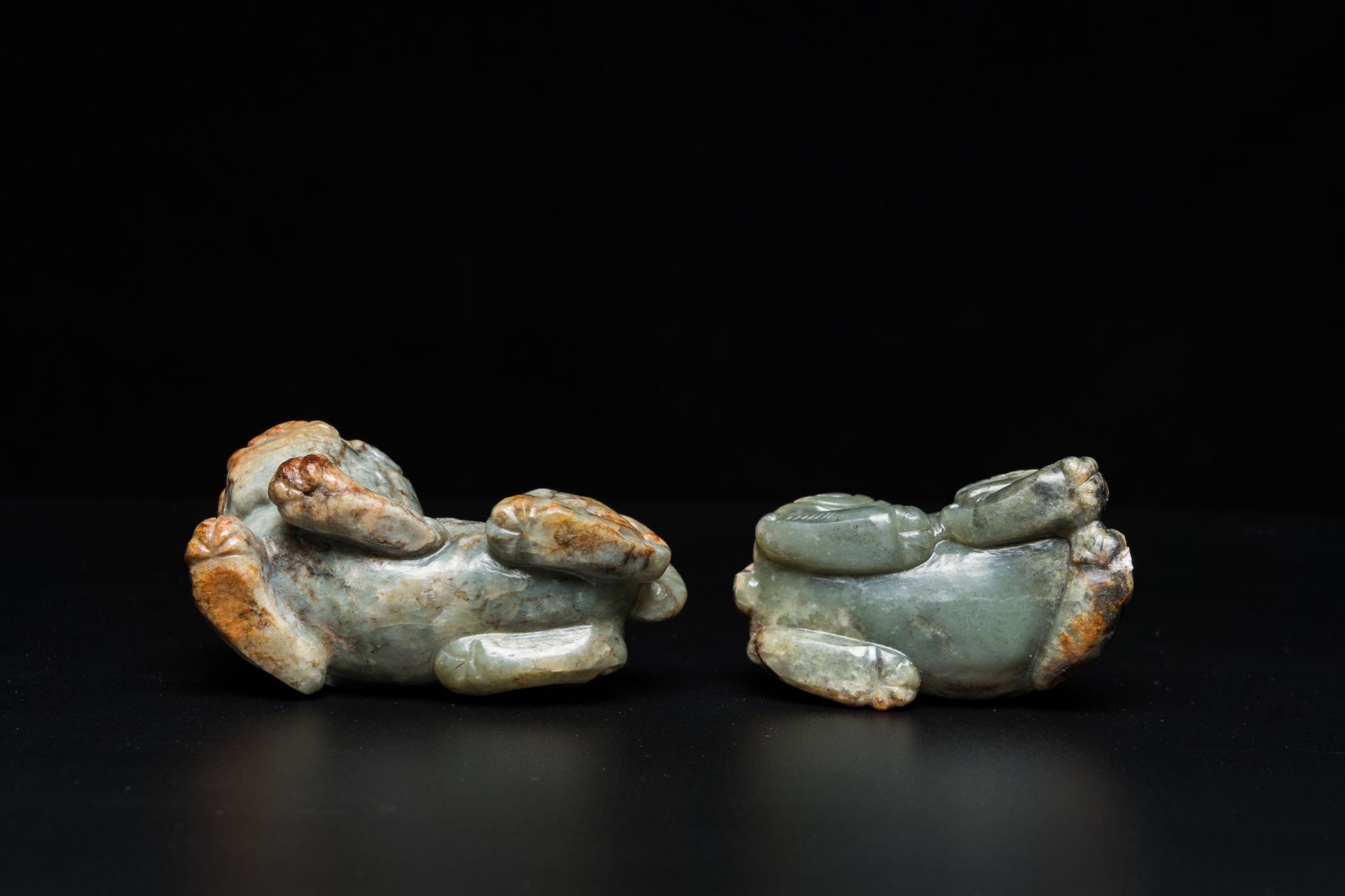 Two Chinese celadon and russet jade Buddhist lion sculptures, Qing - Image 7 of 21