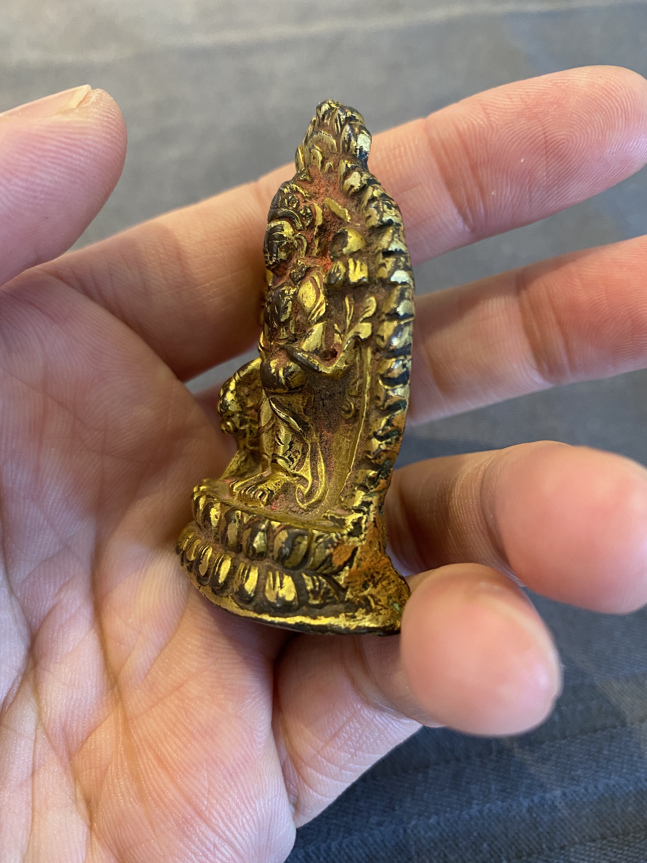 A lacquered gilt bronze miniature Buddha, Tibet or Nepal, 15/16th C. - Image 8 of 12