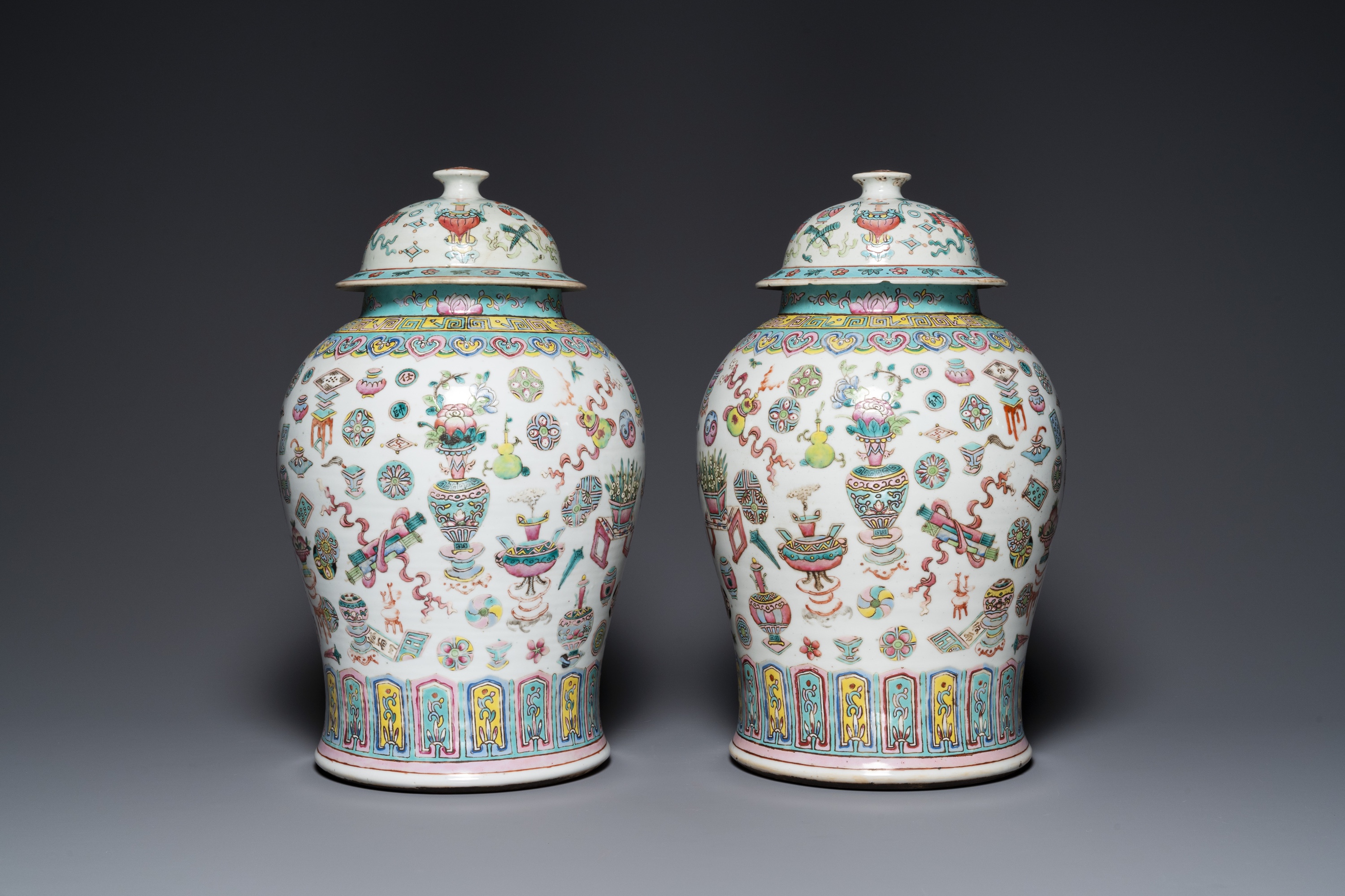A pair of Chinese famille rose 'antiquities' vases and covers, 19th C. - Image 2 of 8