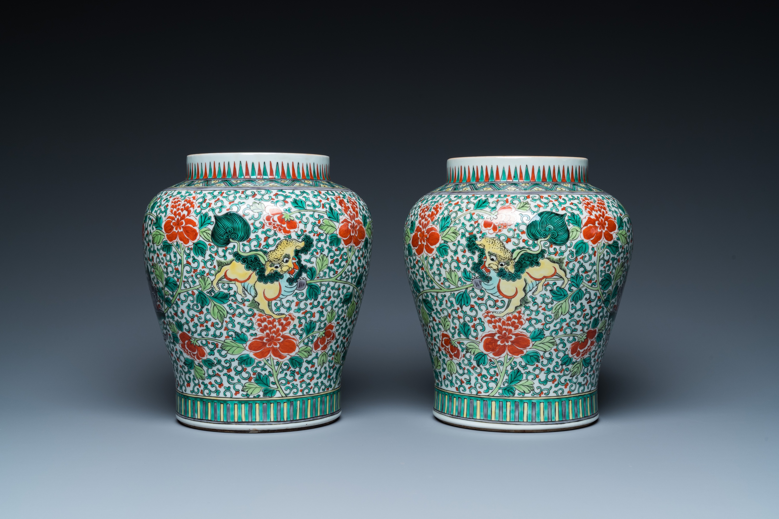 A pair of Chinese famille verte 'Buddhist lions' vases, 19th C. - Image 2 of 16