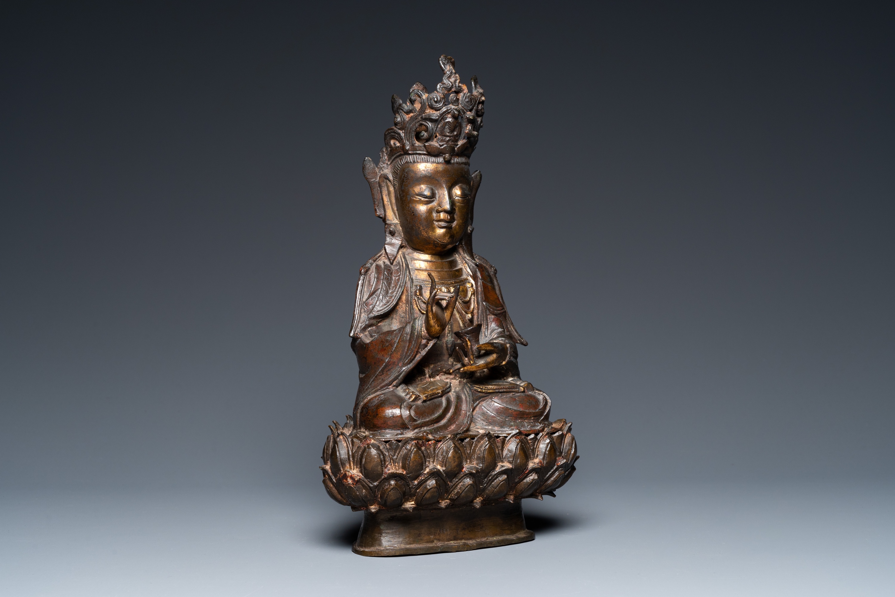 A Chinese partly gilt bronze figure of Guanyin on a lotus throne, Ming - Image 2 of 31