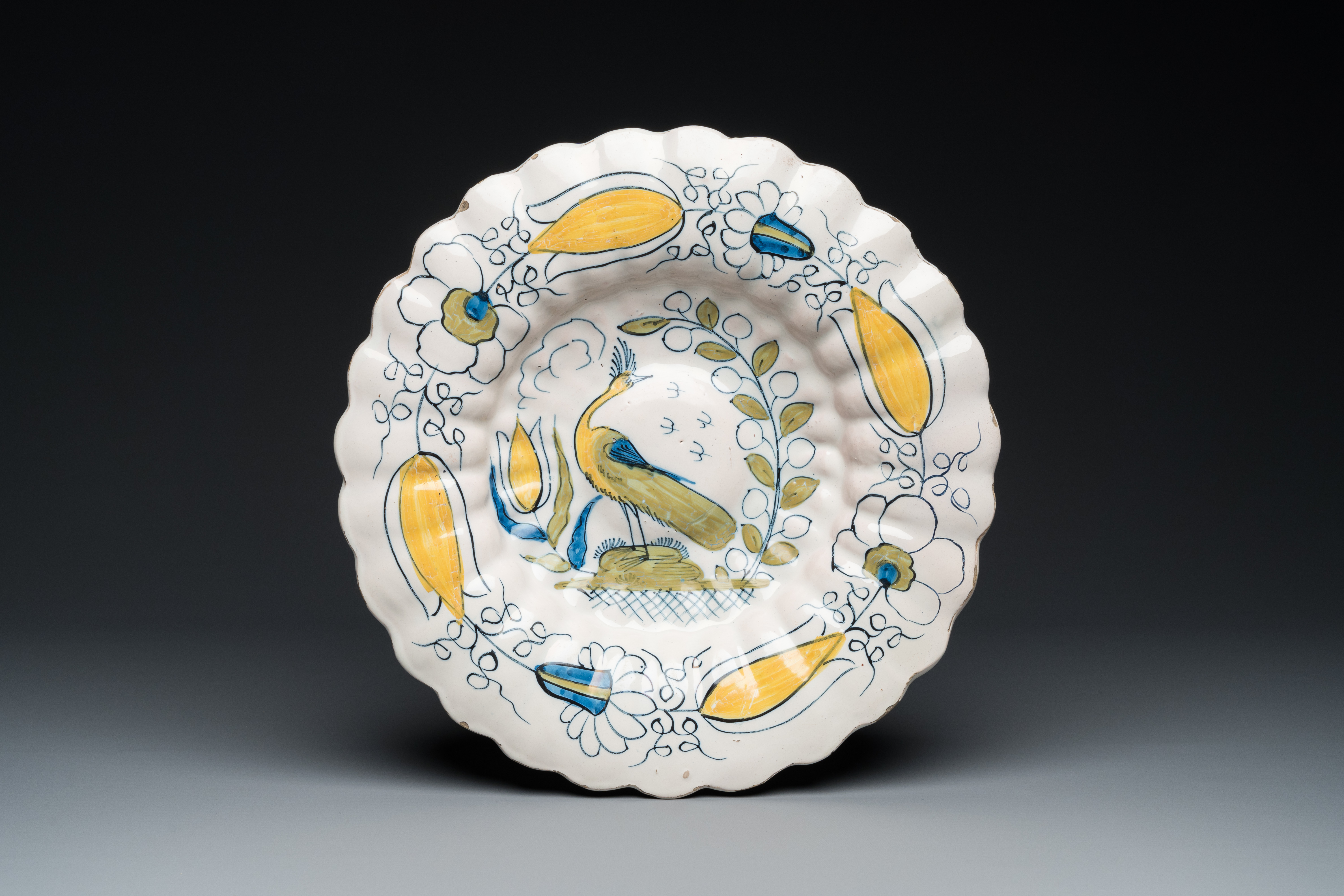 A polychrome Dutch Delft 'peacock' dish, late 17th C.