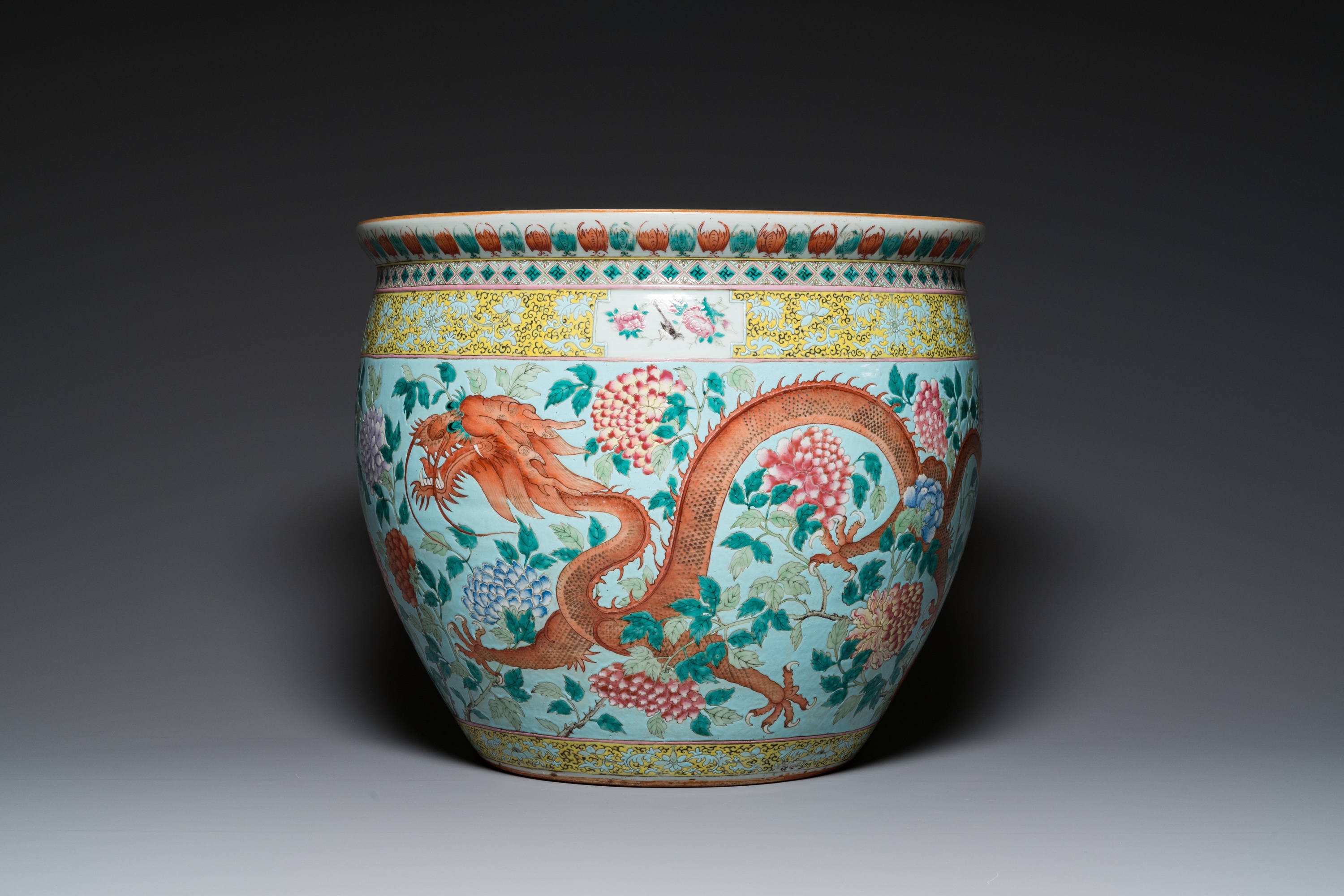 A large Chinese famille verte light blue-ground fish bowl, 19th C. - Image 2 of 28