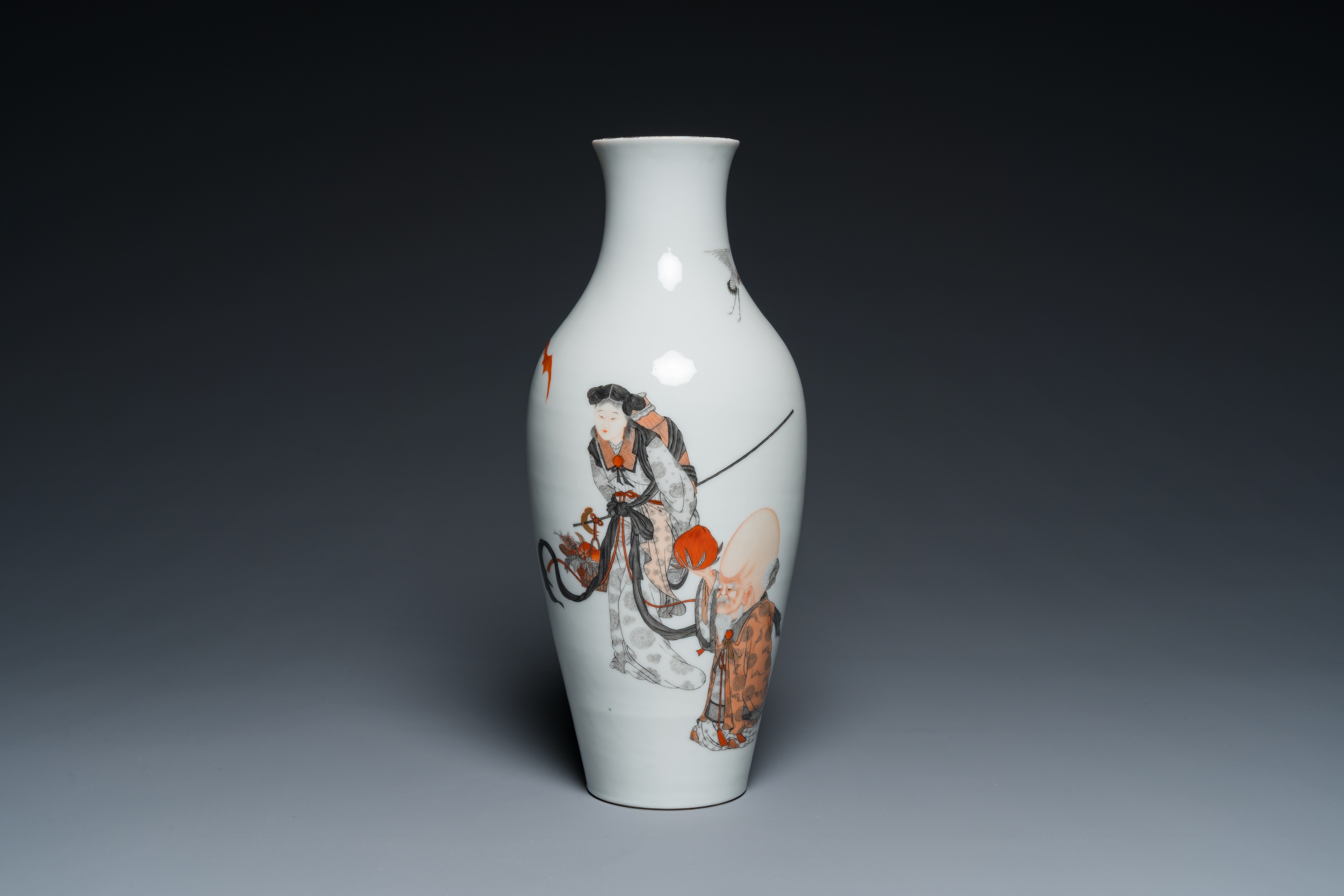 A Chinese iron-red and grisaille 'Shou Lao and Lan Caihe' vase, Hongxian mark, Republic