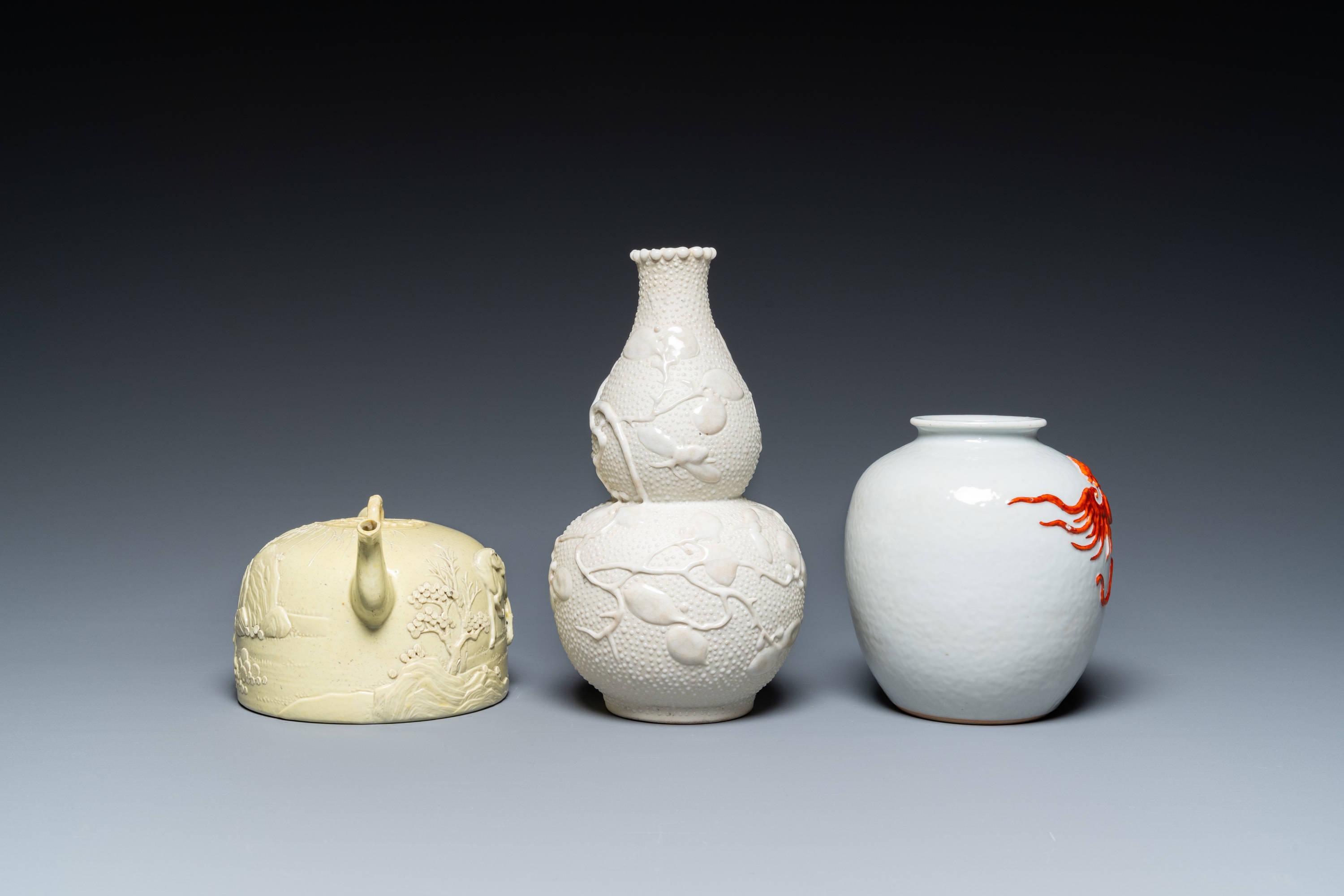 A Chinese yellow-glazed biscuit teapot, a white-glazed biscuit double gourd vase and an iron-red 'ph - Image 3 of 7