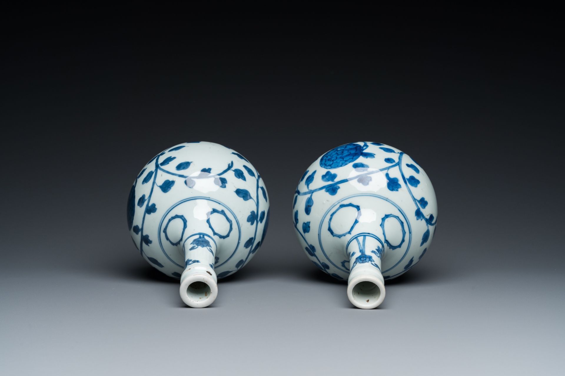 A pair of Chinese blue and white 'peony scroll' pharmacy bottles, Kangxi - Image 5 of 20