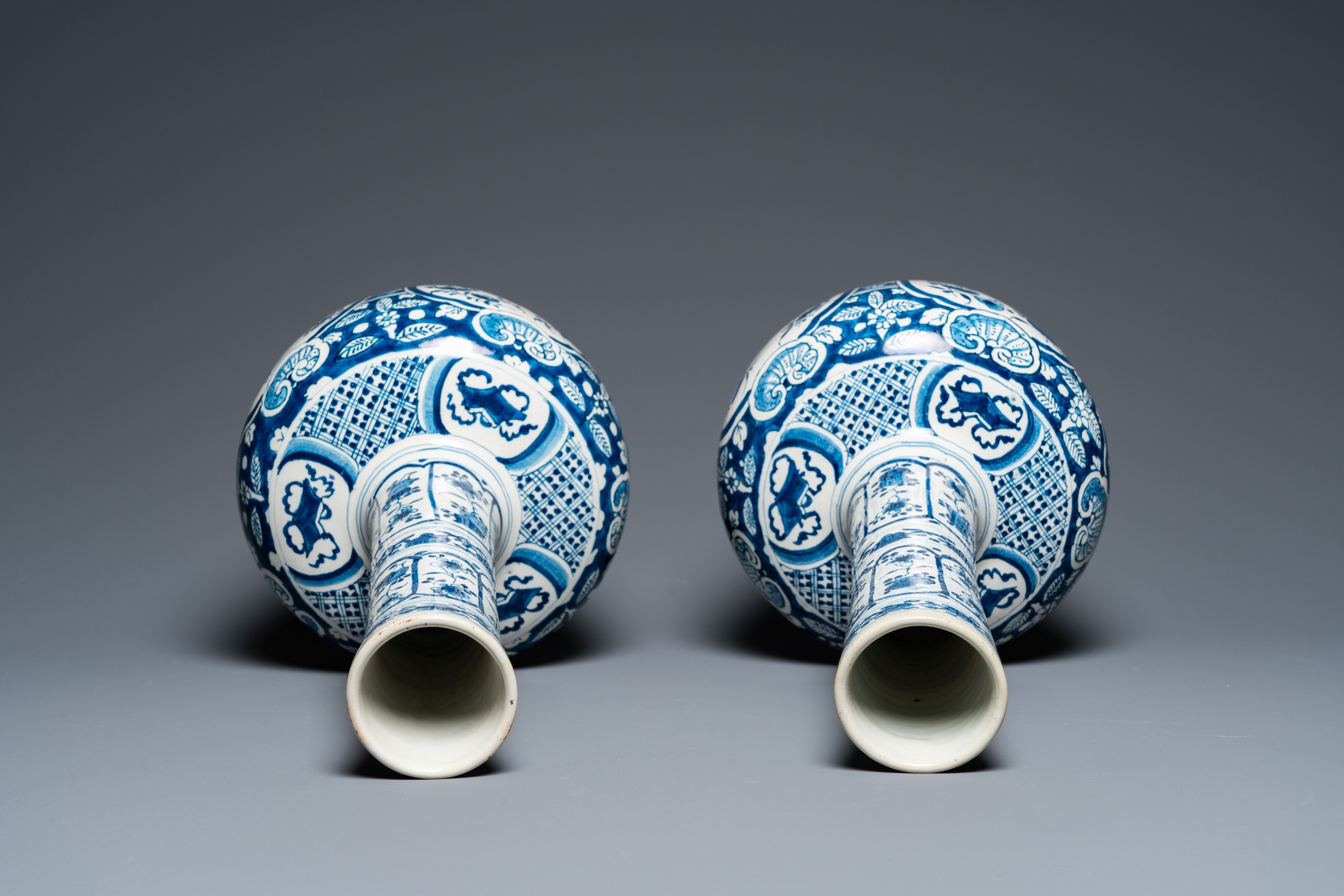 A pair of Dutch Delft blue and white chinoiserie bottle vases, 18th C. - Image 5 of 33