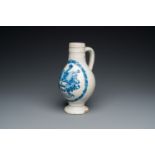 A Portuguese blue and white armorial ewer inscribed Jacob Schršder, Lisbon, dated 1644